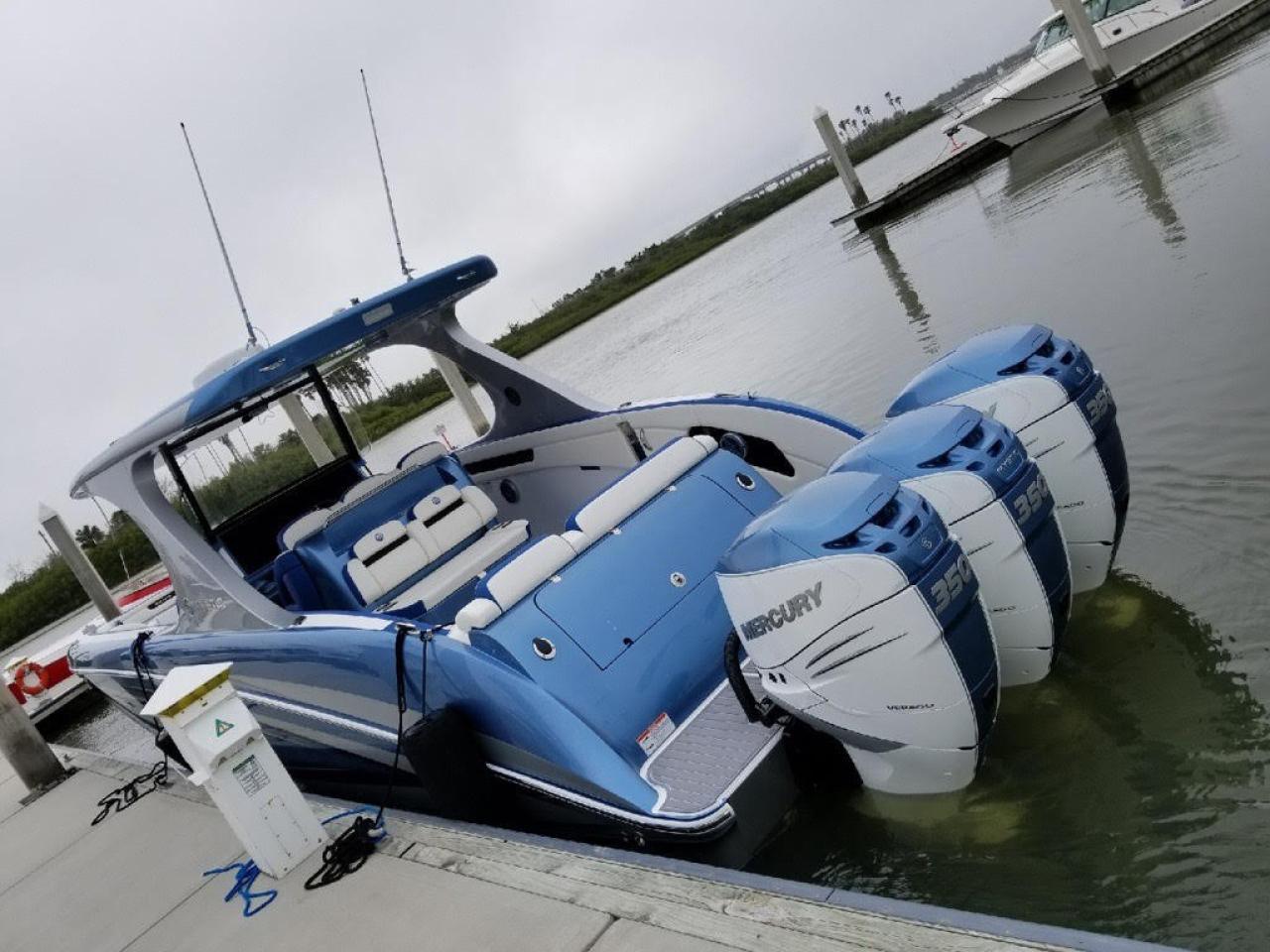 2018 Mystic Powerboats M4200 Center Console Boat t boasts 3 Mercury 350 horsepower Outboards, dual Garmin screens, Auto Pilot, Night Vision, Photo2