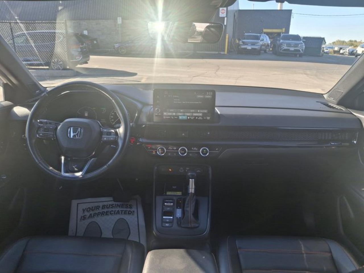 2024 Honda CR-V Hybrid Touring Hybrid | Leather | Sunroof | Nav | Heated Wheel + Seats | CarPlay + Android | and More ! Photo