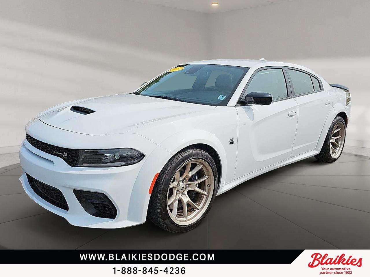 2023 Dodge Charger Widebody Swinger | Limited Edition 1/1000

With only 4,276 km, this 2023 Dodge Charger delivers thrilling 6.4L SRT HEMI V8 power and bold styling in near-new condition. Perfect for drivers who crave performance with a modern edge.

Key Features:

6.4L SRT HEMI V8

Rear-wheel drive

Uconnect 4C with 8.4-inch touchscreen

Apple CarPlay and Android Auto

Performance suspension

Dual exhaust with chrome tips

This Dodge Charger is ready for any journey, blending performance with comfort and modern features. Contact Blaikies Dodge for more details or to schedule a test drive today. Enjoy the convenience of viewing a free CarFax report without submitting personal information. Visit Blaikies Dodge for more details or click to schedule a test drive!