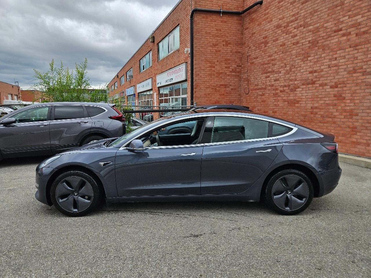 2019 Tesla Model 3 STANDARD RANGE PLUS-AUTOPILOT-CERTIFIED Photo