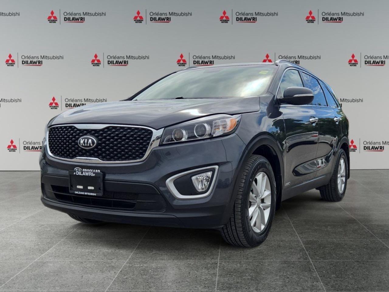 Experience the 2018 Kia Sorento LX in a sophisticated gray shade with AWD that ensures exceptional handling and control on any Canadian terrain. This SUVs dynamic stance is complemented by stylish alloy wheels, providing an impressive curb appeal. Inside, comfort meets functionality with heated front seats, an inviting cabin layout, and convenient features such as keyless entry and power windows. The 2.4L 4-cylinder engine paired with an automatic transmission delivers a smooth driving experience, highlighted by the luxury of heated mirrors for those crisp, frosty mornings. Stay connected and secure with advanced technology features including a backup camera and Bluetooth connection. Enjoy your journey with the dynamic sounds from the satellite radio while considering the support of safety features like brake assist and cruise control, offering peace of mind on the road. This Kia Sorento LX AWD is perfect for families or adventurers seeking reliability, performance, and a touch of luxury. Dont miss out on the opportunity to experience this versatile SUV  contact us today for more information and to schedule your test drive!
