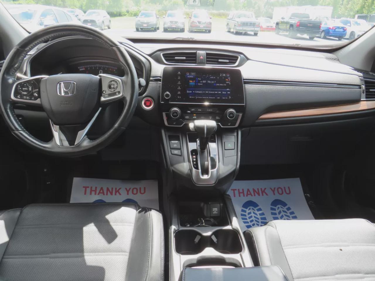 2019 Honda CR-V Touring (**LOW KM!!**CLEAN TITLE/NO ACCIDENTS!!**SAFETY/CERTIFIED!!**AWD**ALLOY RIMS**LEATHER**SUNROOF**NAVIGATION**BLIND SPOT MONITORING**REVERSE CAMERA**DIGITAL TOUCHSCREEN**HEATED SEATS**REAR PRIVACY COVER**CRUISE CONTROL**BLUETOOTH**) Photo