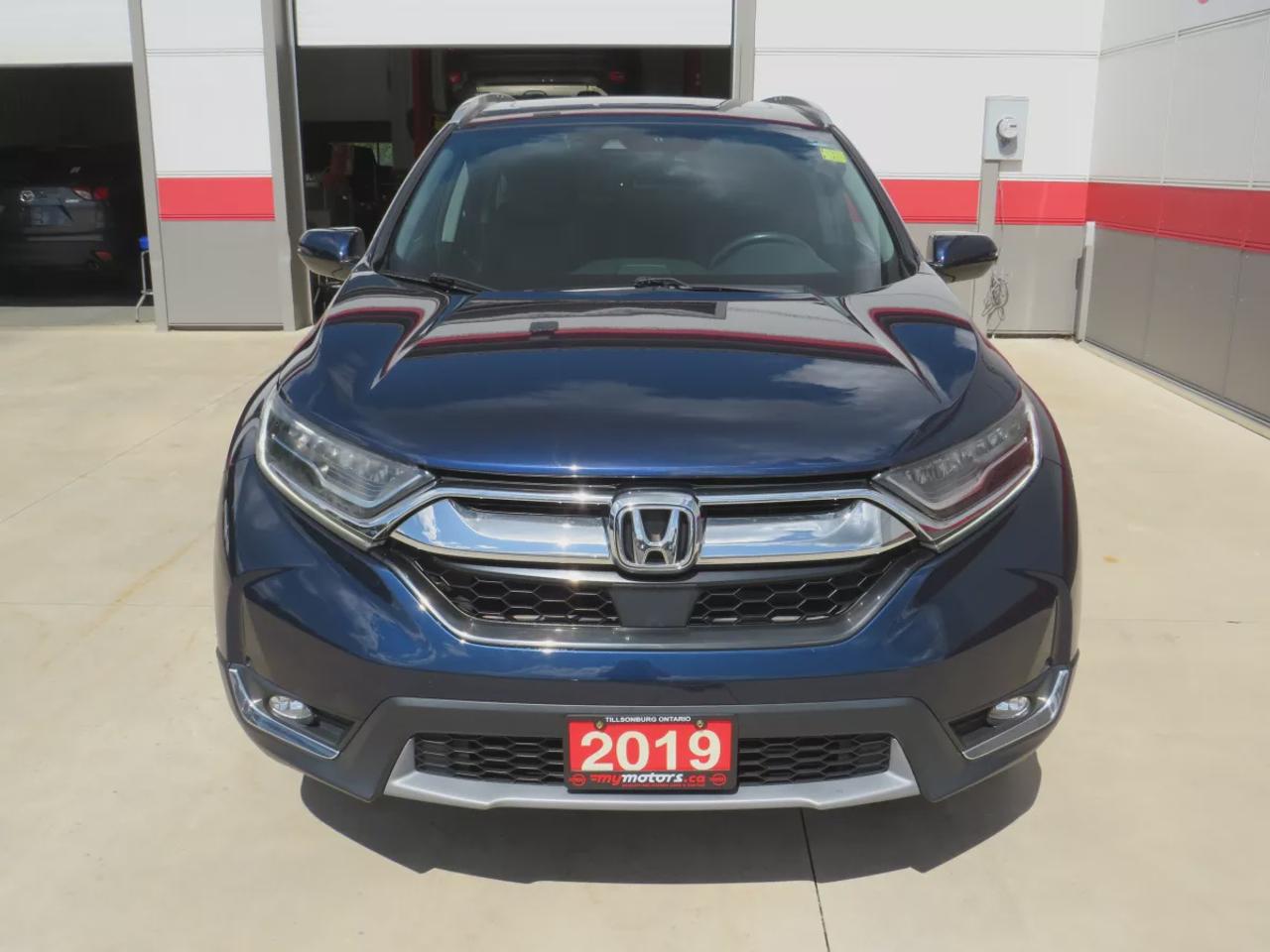 2019 Honda CR-V Touring (**LOW KM!!**CLEAN TITLE/NO ACCIDENTS!!**SAFETY/CERTIFIED!!**AWD**ALLOY RIMS**LEATHER**SUNROOF**NAVIGATION**BLIND SPOT MONITORING**REVERSE CAMERA**DIGITAL TOUCHSCREEN**HEATED SEATS**REAR PRIVACY COVER**CRUISE CONTROL**BLUETOOTH**) Photo