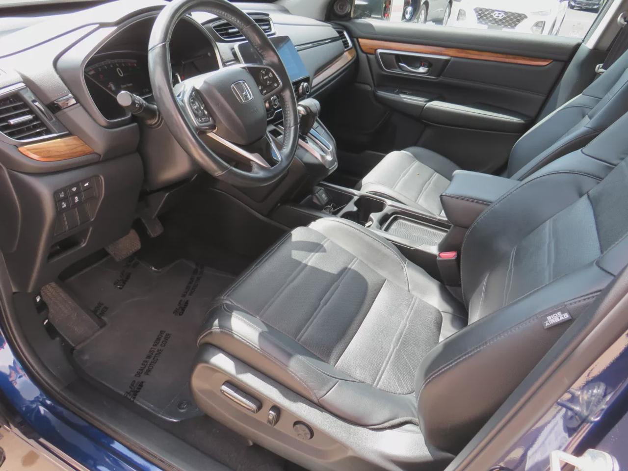 2019 Honda CR-V Touring (**LOW KM!!**CLEAN TITLE/NO ACCIDENTS!!**SAFETY/CERTIFIED!!**AWD**ALLOY RIMS**LEATHER**SUNROOF**NAVIGATION**BLIND SPOT MONITORING**REVERSE CAMERA**DIGITAL TOUCHSCREEN**HEATED SEATS**REAR PRIVACY COVER**CRUISE CONTROL**BLUETOOTH**) Photo