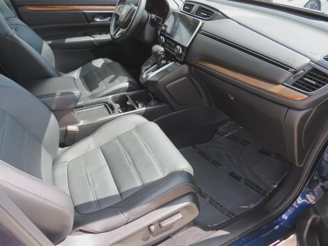 2019 Honda CR-V Touring (**LOW KM!!**CLEAN TITLE/NO ACCIDENTS!!**SAFETY/CERTIFIED!!**AWD**ALLOY RIMS**LEATHER**SUNROOF**NAVIGATION**BLIND SPOT MONITORING**REVERSE CAMERA**DIGITAL TOUCHSCREEN**HEATED SEATS**REAR PRIVACY COVER**CRUISE CONTROL**BLUETOOTH**) Photo