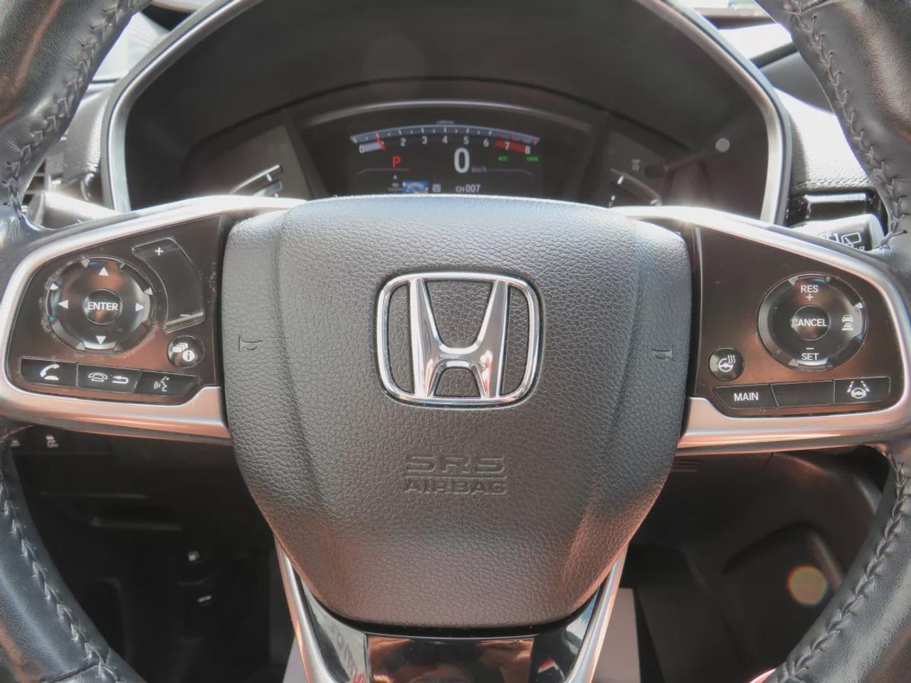 2019 Honda CR-V Touring (**LOW KM!!**CLEAN TITLE/NO ACCIDENTS!!**SAFETY/CERTIFIED!!**AWD**ALLOY RIMS**LEATHER**SUNROOF**NAVIGATION**BLIND SPOT MONITORING**REVERSE CAMERA**DIGITAL TOUCHSCREEN**HEATED SEATS**REAR PRIVACY COVER**CRUISE CONTROL**BLUETOOTH**) Photo