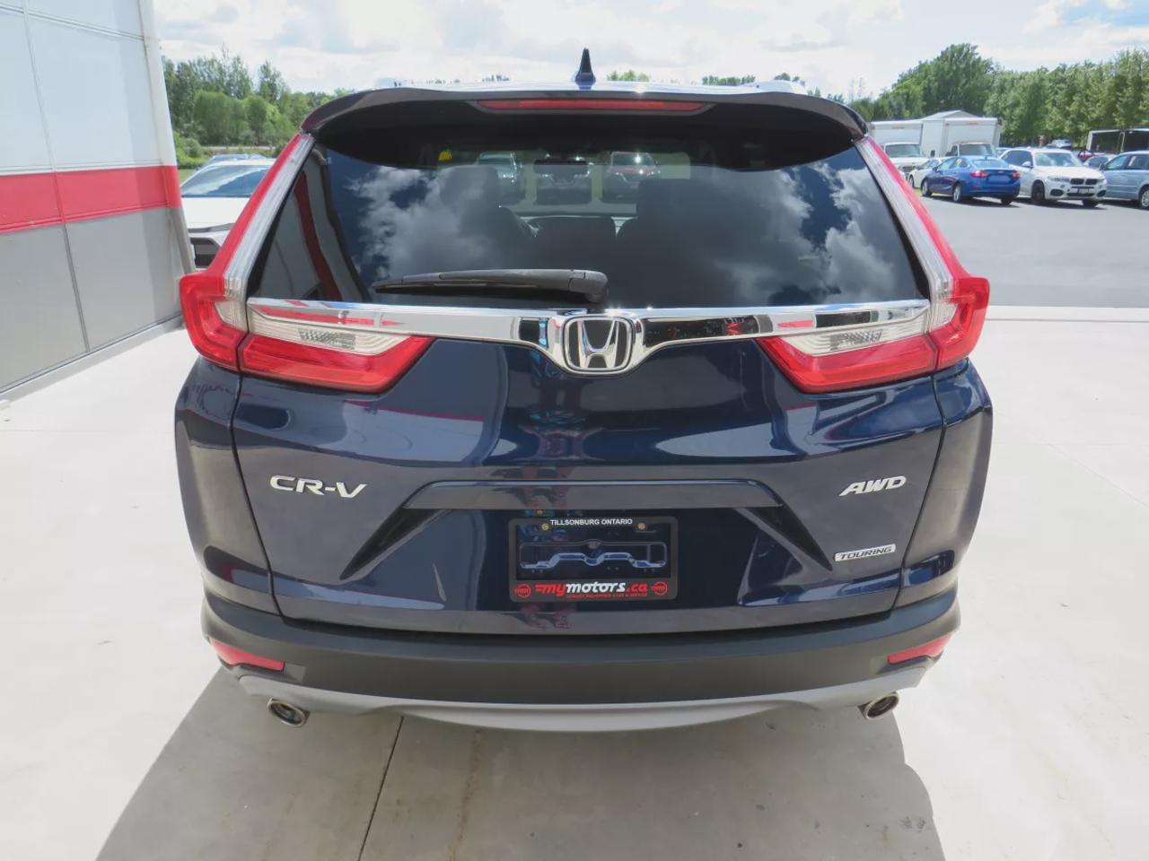 2019 Honda CR-V Touring (**LOW KM!!**CLEAN TITLE/NO ACCIDENTS!!**SAFETY/CERTIFIED!!**AWD**ALLOY RIMS**LEATHER**SUNROOF**NAVIGATION**BLIND SPOT MONITORING**REVERSE CAMERA**DIGITAL TOUCHSCREEN**HEATED SEATS**REAR PRIVACY COVER**CRUISE CONTROL**BLUETOOTH**) Photo