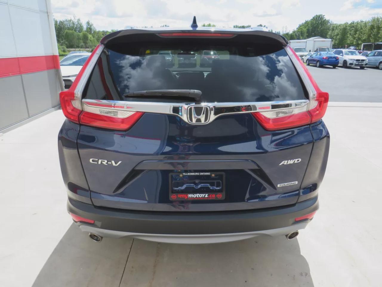 2019 Honda CR-V Touring (**LOW KM!!**CLEAN TITLE/NO ACCIDENTS!!**SAFETY/CERTIFIED!!**AWD**ALLOY RIMS**LEATHER**SUNROOF**NAVIGATION**BLIND SPOT MONITORING**REVERSE CAMERA**DIGITAL TOUCHSCREEN**HEATED SEATS**REAR PRIVACY COVER**CRUISE CONTROL**BLUETOOTH**) Photo
