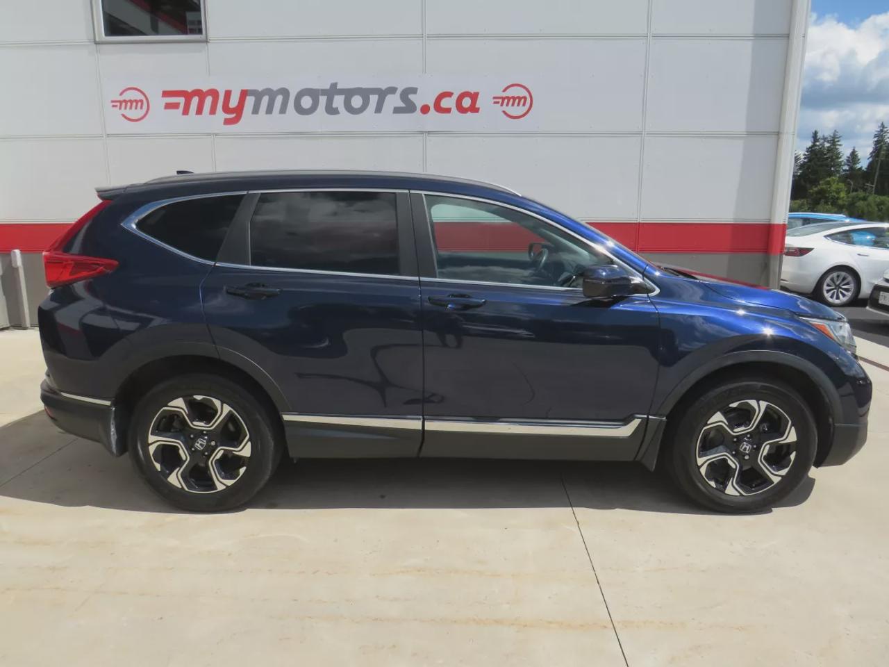 2019 Honda CR-V Touring (**LOW KM!!**CLEAN TITLE/NO ACCIDENTS!!**SAFETY/CERTIFIED!!**AWD**ALLOY RIMS**LEATHER**SUNROOF**NAVIGATION**BLIND SPOT MONITORING**REVERSE CAMERA**DIGITAL TOUCHSCREEN**HEATED SEATS**REAR PRIVACY COVER**CRUISE CONTROL**BLUETOOTH**) Photo