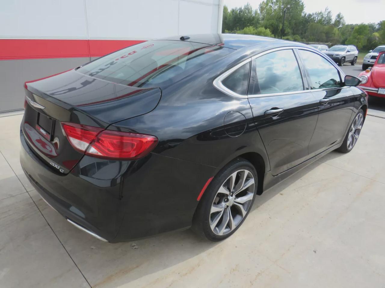 2015 Chrysler 200 C (**CLEAN TITLE/NO ACCIDENTS!!**SAFETY/CERTIFIED!!**ALLOY RIMS**REMOTE START**LEATHER**NAVIGATION**HEATED SEATS**FOG LIGHTS**POWER SEATS**REVERSE CAMERA**DIGITAL TOUCHSCREEN**PUSH BUTTON START**CRUISE CONTROL**BLUETOOTH**) Photo