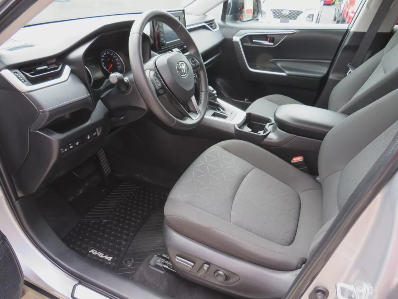 2021 Toyota RAV4 XLE  | Very Low Km | Clean Title | No Accidents | Safety Certified | Sunroof | Alloy Rims | Power Seats | Leather Wrapped Steering Wheel | Power Tailgate | Rear Cargo Mat | Rear Privacy Cover | Custom Toyota Floor Mats | Bluetooth | Cruise Control Photo