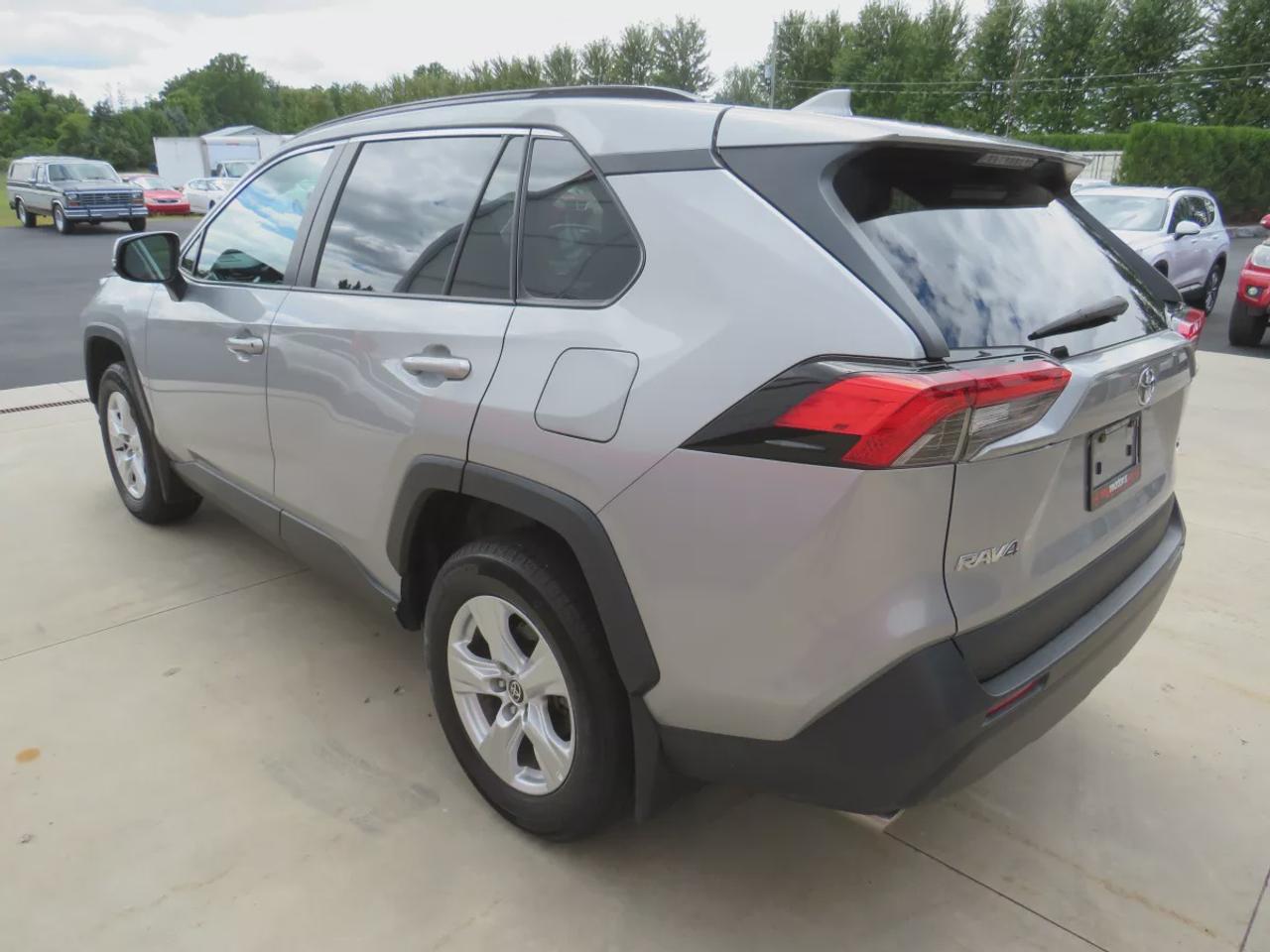 2021 Toyota RAV4 XLE  | Very Low Km | Clean Title | No Accidents | Safety Certified | Sunroof | Alloy Rims | Power Seats | Leather Wrapped Steering Wheel | Power Tailgate | Rear Cargo Mat | Rear Privacy Cover | Custom Toyota Floor Mats | Bluetooth | Cruise Control Photo