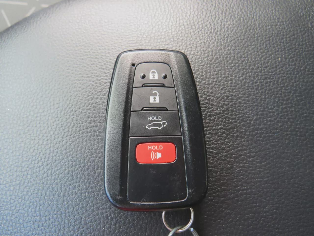 2021 Toyota RAV4 XLE  | Very Low Km | Clean Title | No Accidents | Safety Certified | Sunroof | Alloy Rims | Power Seats | Leather Wrapped Steering Wheel | Power Tailgate | Rear Cargo Mat | Rear Privacy Cover | Custom Toyota Floor Mats | Bluetooth | Cruise Control Photo