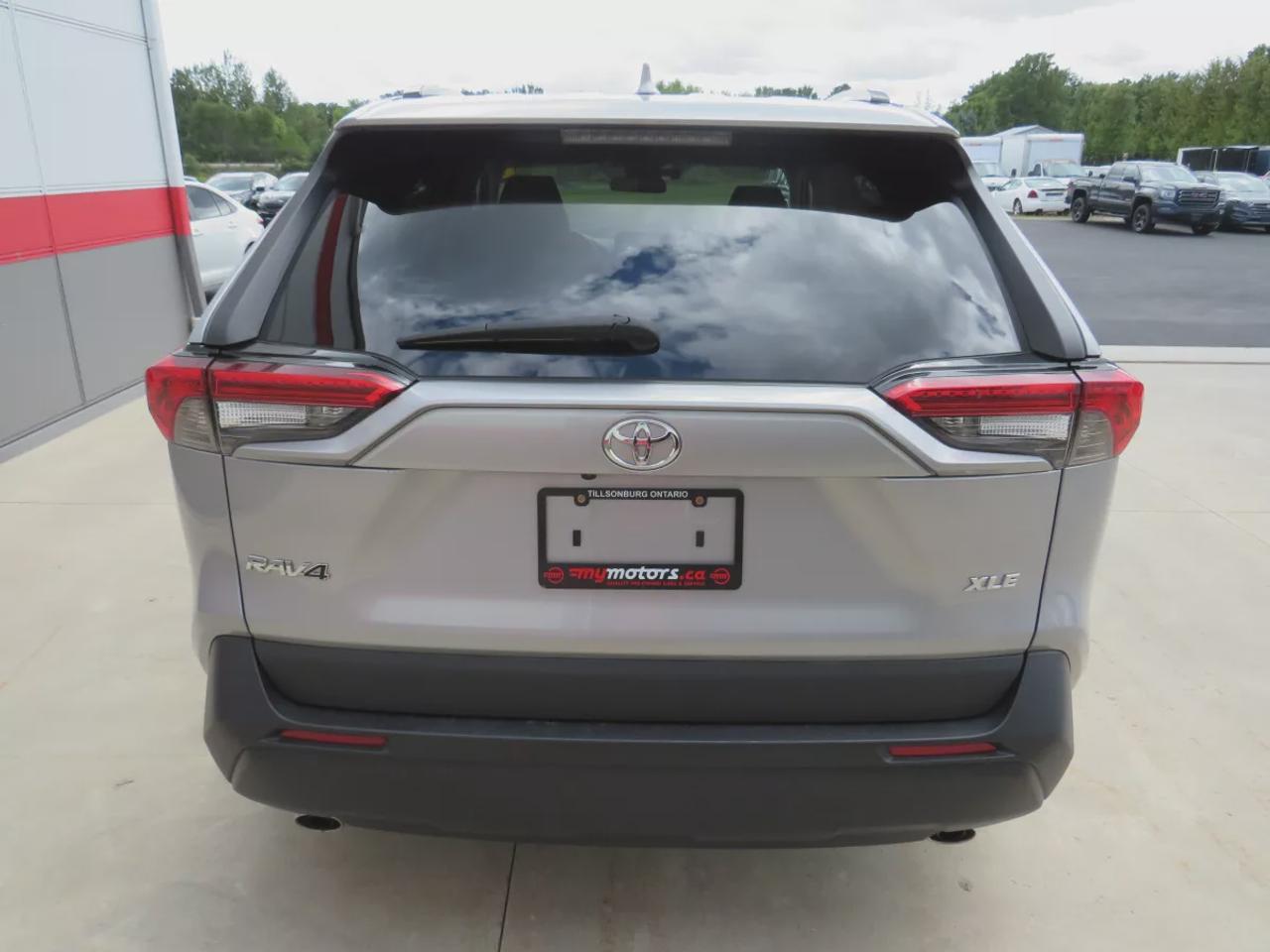 2021 Toyota RAV4 XLE  | Very Low Km | Clean Title | No Accidents | Safety Certified | Sunroof | Alloy Rims | Power Seats | Leather Wrapped Steering Wheel | Power Tailgate | Rear Cargo Mat | Rear Privacy Cover | Custom Toyota Floor Mats | Bluetooth | Cruise Control Photo