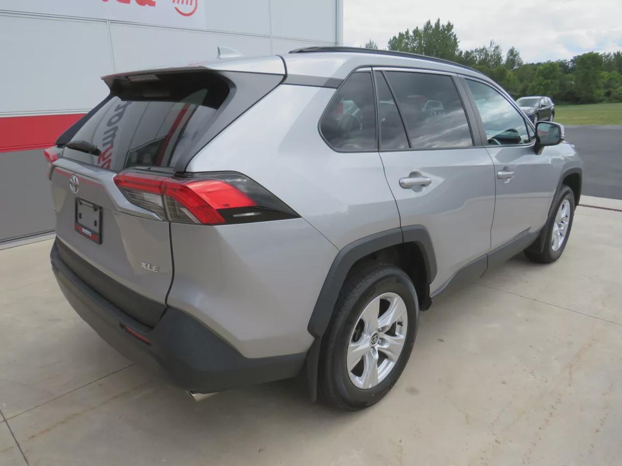 2021 Toyota RAV4 XLE  | Very Low Km | Clean Title | No Accidents | Safety Certified | Sunroof | Alloy Rims | Power Seats | Leather Wrapped Steering Wheel | Power Tailgate | Rear Cargo Mat | Rear Privacy Cover | Custom Toyota Floor Mats | Bluetooth | Cruise Control Photo