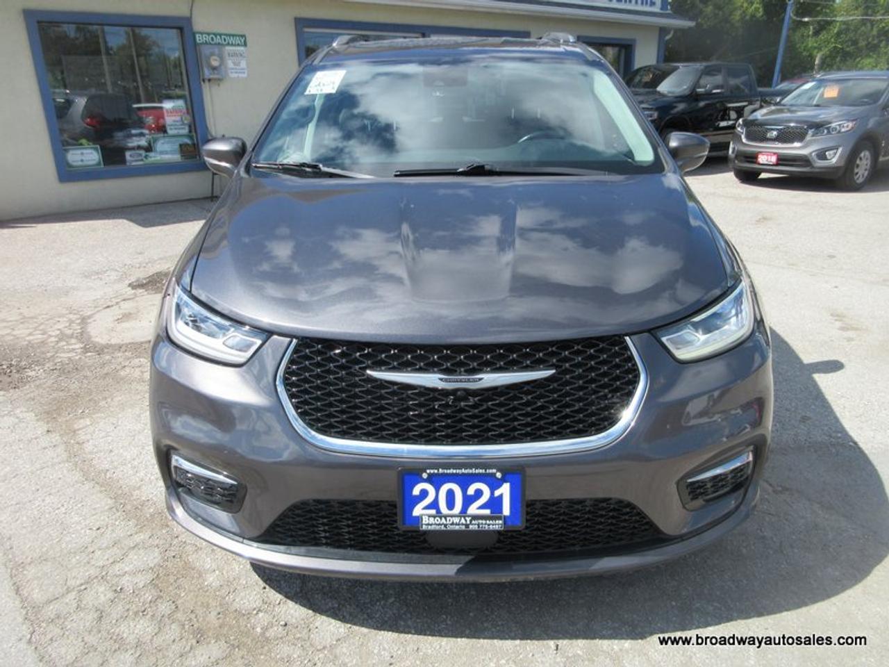 2021 Chrysler Pacifica ALL-WHEEL DRIVE TOURING-VERSION 7 PASSENGER 3.6L - V6.. CAPTAINS.. 3RD ROW.. NAVIGATION.. POWER DOORS & TAILGATE.. LEATHER.. HEATED SEATS & WHEEL.. Photo
