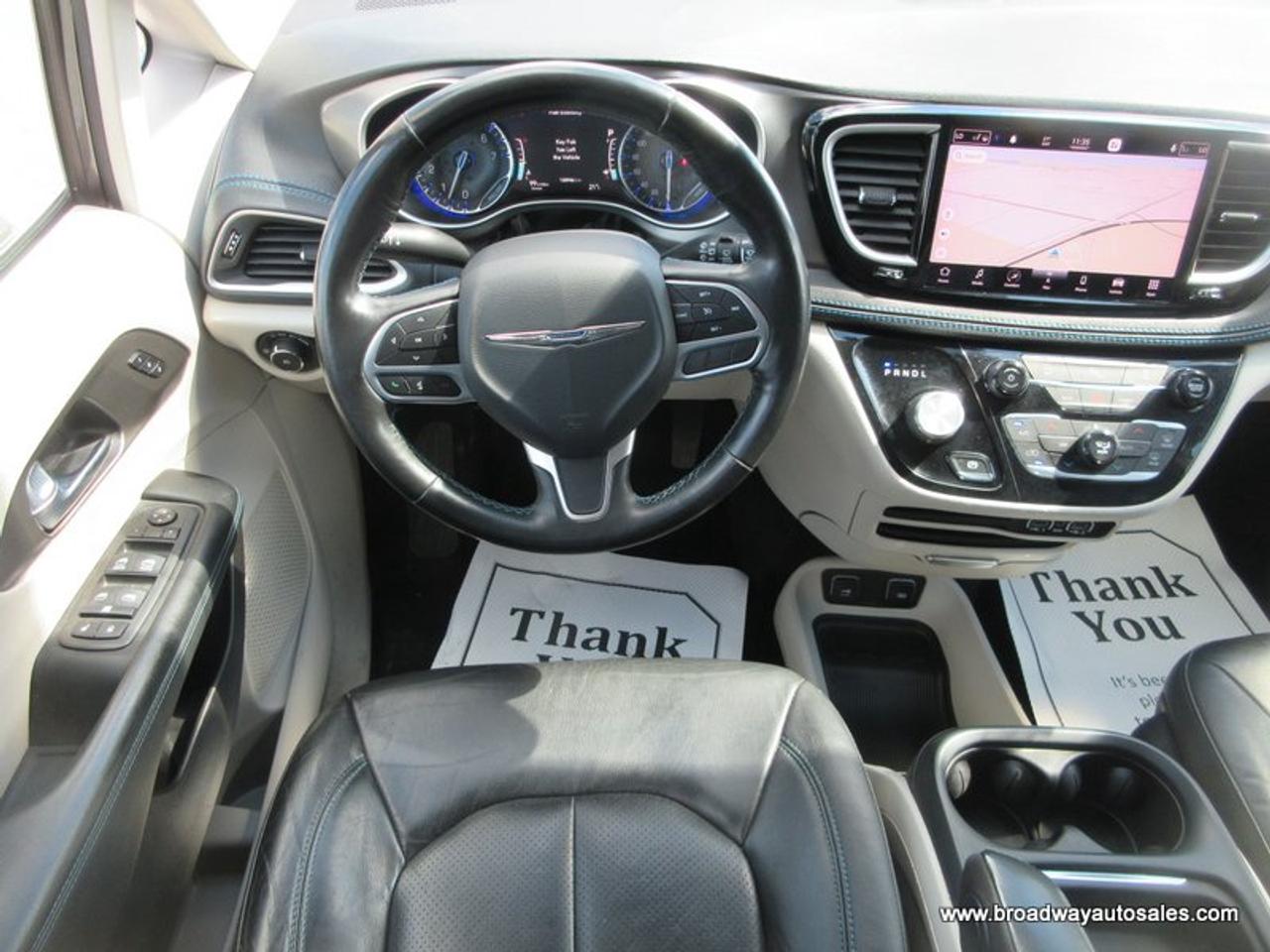 2021 Chrysler Pacifica ALL-WHEEL DRIVE TOURING-VERSION 7 PASSENGER 3.6L - V6.. CAPTAINS.. 3RD ROW.. NAVIGATION.. POWER DOORS & TAILGATE.. LEATHER.. HEATED SEATS & WHEEL.. Photo