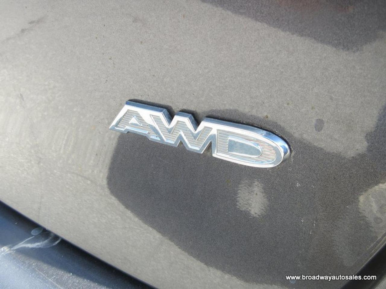 2021 Chrysler Pacifica ALL-WHEEL DRIVE TOURING-VERSION 7 PASSENGER 3.6L - V6.. CAPTAINS.. 3RD ROW.. NAVIGATION.. POWER DOORS & TAILGATE.. LEATHER.. HEATED SEATS & WHEEL.. Photo