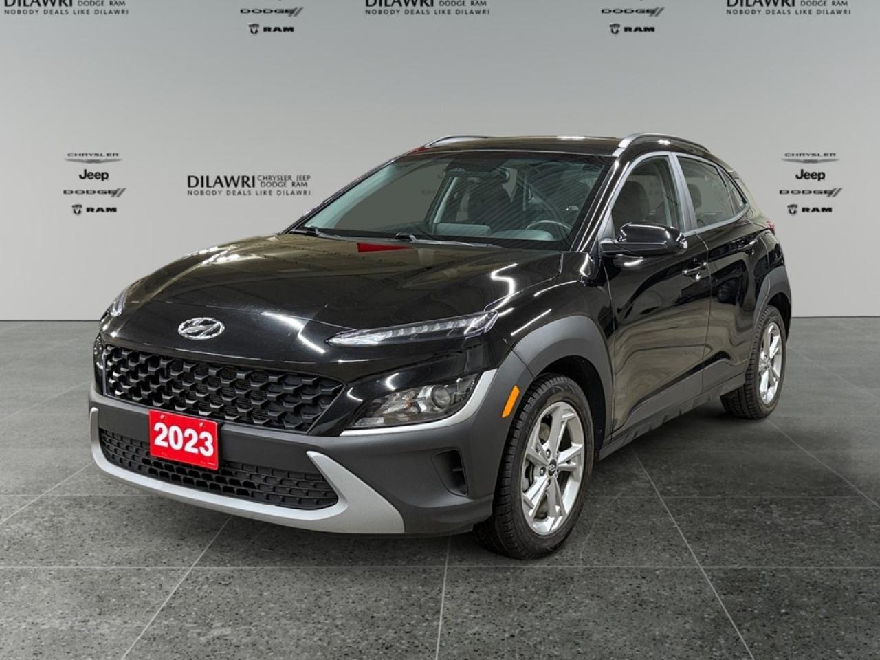 Get ready to experience the 2023 Hyundai Kona 2.0L Preferred AWD, dressed in a sophisticated black exterior that exudes style and offers exceptional all-wheel drive handling. This SUV promises to elevate your driving experience with confidence and agility, whether on city streets or in the great outdoors. With its bold design and a set of stylish alloy wheels, the Kona makes a striking impression from every angle. Inside, you will find a thoughtfully designed cabin complete with premium features, including a leather-wrapped steering wheel, heated front seats, and a modern leather/metal-look gear shifter material that add a touch of luxury to your daily commute. The Kona Preferred offers advanced technology and comfort features to make every drive enjoyable. Stay connected with ease thanks to smart device integration and Bluetooth connectivity. Safety features such as lane assist and brake assist ensure peace of mind, while the backup camera and keyless entry add convenience to your travels. With an impressive array of features like satellite radio, heated mirrors, and remote start, this Hyundai Kona is perfect for individuals or families looking for comfort and advanced tech in a versatile package. Contact us today to schedule a test drive and experience everything this extraordinary SUV has to offer!