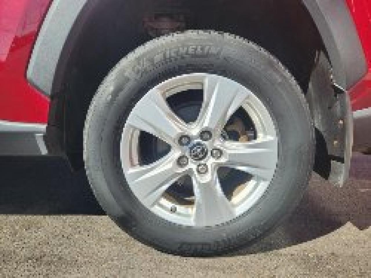 12895340