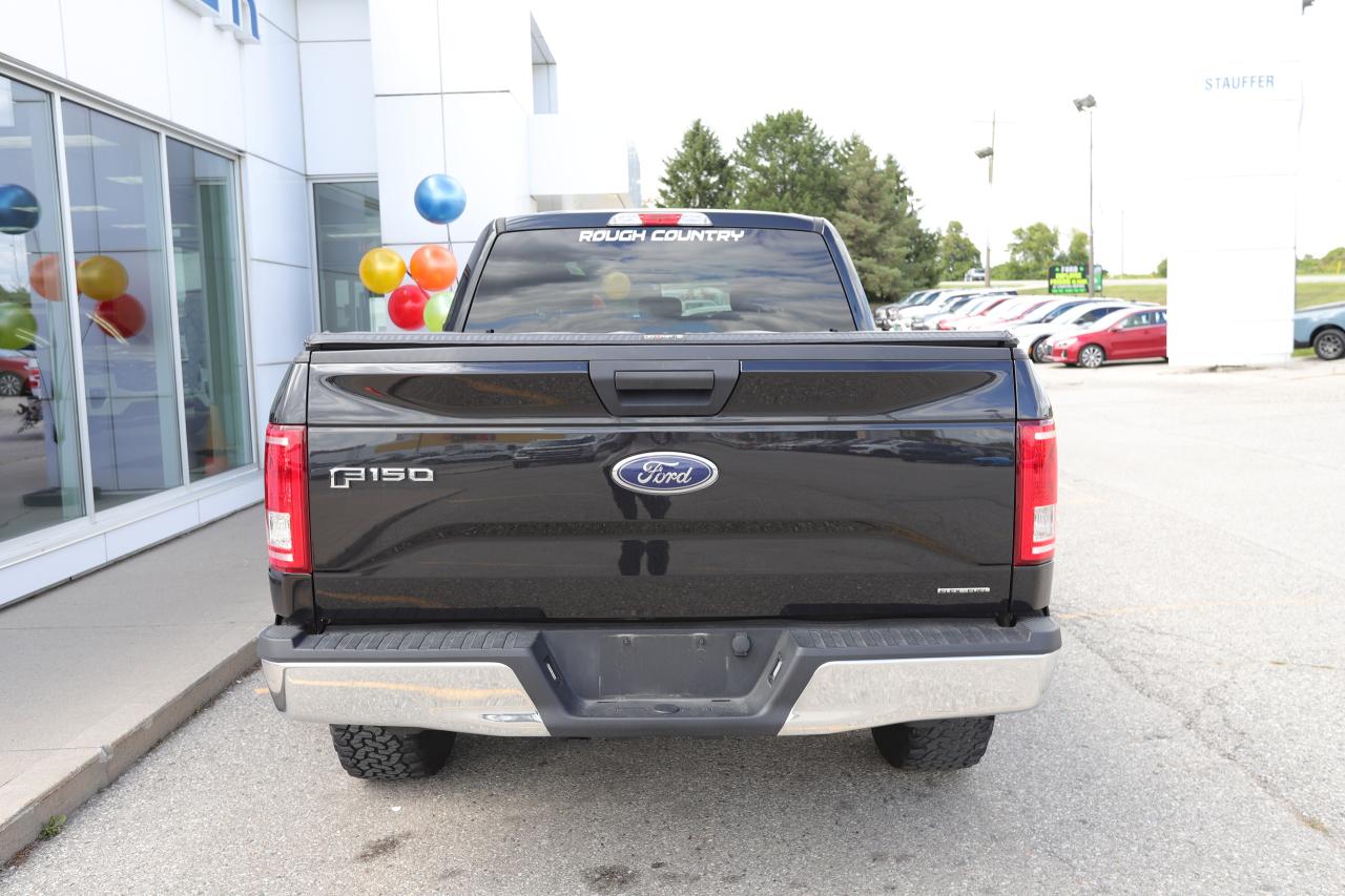 2015 Ford F-150 XLT 4WD SuperCab 145 Photo4