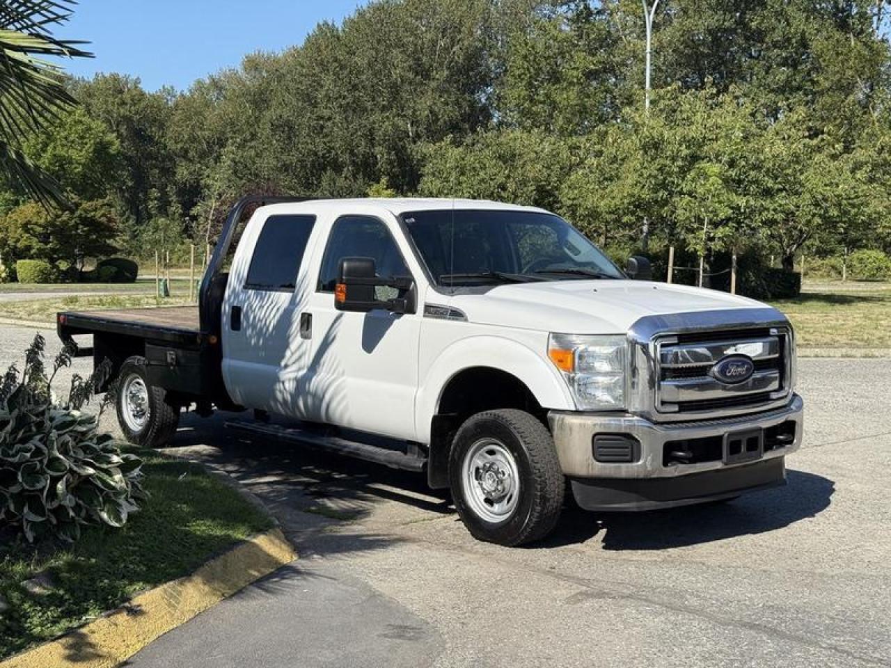 Used 2012 Ford F-350 SD Crew Cab 9 Foot Flat Deck 4WD for sale in Burnaby, BC