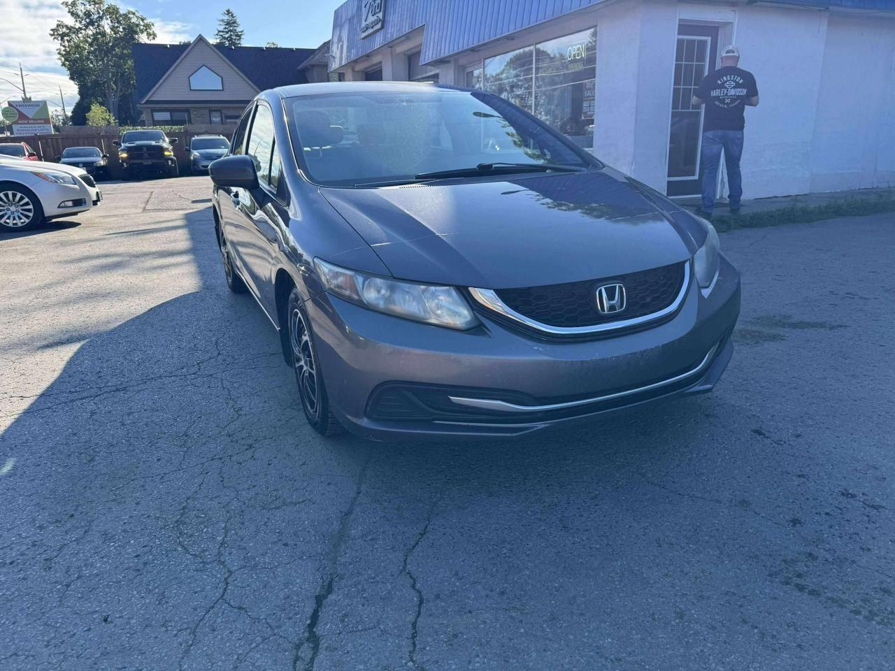 2015 Honda Civic 4dr Man LX Photo0