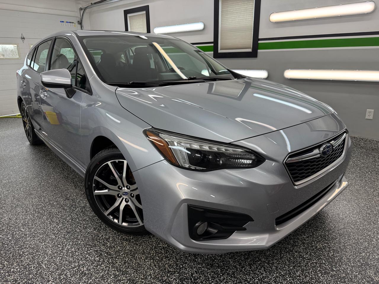 <p>At RuralWorx Auto Sales we have a 2018 Subaru Impreza Sport AWD! This hatchback looks and drives great & is equipped with a AUTOMATIC transmission! It also comes with a BRAND NEW MVI, LIKE NEW TIRES on factory alloys, a fresh oil change & a CLEAN CARFAX (No accidents)<span class=Apple-converted-space>&nbsp;</span></p><p>&nbsp;</p><p>About this vehicle;</p><p>-137,000km</p><p>-HEATED SEATS</p><p>-ALL WHEEL DRIVE<span class=Apple-converted-space>&nbsp;</span></p><p>-Power Windows<span class=Apple-converted-space>&nbsp;</span></p><p>-Power mirrors<span class=Apple-converted-space>&nbsp;</span></p><p>-Power locks</p><p>-Sunroof</p><p>-Reverse camera<span class=Apple-converted-space>&nbsp;</span></p><p>-Cruise control<span class=Apple-converted-space>&nbsp;</span></p><p>-Bluetooth</p><p>-Keyless entry</p><p>-AIR CONDITIONING<span class=Apple-converted-space>&nbsp;</span></p><p>-Fresh oil change<span class=Apple-converted-space>&nbsp;</span></p><p>-Freshly detailed inside and out<span class=Apple-converted-space>&nbsp;</span></p><p>And more..</p><p>&nbsp;</p><p>Priced at ONLY: $16,995 plus taxes & admin*</p><p>&nbsp;</p><p>If you are interested in viewing this reliable hatchback or have any questions or concerns please email/message or call/text 902-956-0179. Contact us ANYTIME! Thank you for viewing! Feel free to check out our other ads, or contact us if you have a certain car in mind! WE WILL FIND IT FOR YOU!<span class=Apple-converted-space>&nbsp;</span></p><p>&nbsp;</p><p>You can also visit our Facebook & Instagram to stay up to date on our new vehicles and GIVEAWAYS we have throughout the year! Also check out our REVIEWS!<span class=Apple-converted-space>&nbsp;</span></p><p>&nbsp;</p><p>Facebook: RuralWorx AutoSales<span class=Apple-converted-space>&nbsp;</span></p><p>Instagram: ruralworx_autosales</p><p>&nbsp;</p><p>*admin is $499, licensing and taxes to be determined</p>