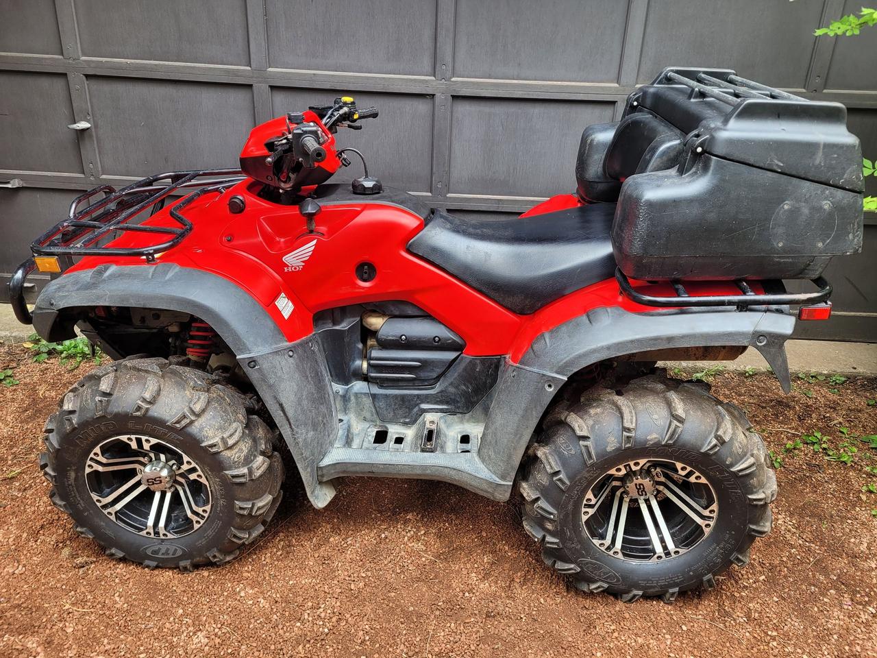 <p>One Owner, Financing Available & Trade-ins Welcome!</p><p>ITP SS Wheels with 26 Mud Lite Tires & KIMPEX Deluxe Cargo Box</p><p>The 2012 Honda Rubicon CTE refers to the 2012 Honda FourTrax Foreman Rubicon 500 with Electric Power Steering (TRX500FGA), a Canadian-market model sometimes called the Canadian Trail Edition (CTE) due to its specific features like adjustable shocks. It features a beltless hydro-mechanical automatic transmission (Hondamatic), a 499cc engine, selectable 2WD/4WD with a torque-sensing front differential, independent front suspension, and swingarm rear suspension.</p><div class=WaaZC style=color: #001d35; font-family: Google Sans, Arial, sans-serif; font-size: 18px; background-color: #ffffff;><div class=RJPOee EIJn2 style=animation: auto ease 0s 1 normal none running none !important;><div class=rPeykc uP58nb style=margin: 20px 0px 10px; line-height: 26px; data-hveid=CBUQAQ data-ved=2ahUKEwiz1J7fsamPAxW-kIkEHSiJPHIQo_EKegQIFRAB><span data-huuid=5223686949568572065><span data-huuid=5223686949568572065><span role=heading aria-level=2>Key Features and Specifications:</span><span class=pjBG2e data-cid=7de929b7-7547-474d-a5e9-a512a9bdfdfc><span class=UV3uM style=text-wrap-mode: nowrap;>&nbsp;</span></span></span></span><div class=NPrrbc style=margin-inline-end: 6px; display: inline-flex; data-cid=7de929b7-7547-474d-a5e9-a512a9bdfdfc data-uuids=5223686949568572065><div class=BMebGe btku5b fCrZyc LwdV0e FR7ZSc qVhvac OJeuxf style=display: inline-block; vertical-align: middle; cursor: pointer; outline: 0px; -webkit-tap-highlight-color: transparent; color: #0b57d0; tabindex=0 role=button aria-label=View related links data-hveid=CBQQAQ data-ved=2ahUKEwiz1J7fsamPAxW-kIkEHSiJPHIQ3fYKegQIFBAB><div class=niO4u style=display: flex; -webkit-box-pack: center; justify-content: center; position: relative; -webkit-box-align: stretch; align-items: stretch; width: 28px; border-radius: 9999px; background-color: transparent; margin: 0px auto; outline: transparent solid 1px; outline-offset: -1px; height: 20px; min-height: 20px;><div class=kHtcsd style=display: flex; -webkit-box-align: center; align-items: center; -webkit-box-pack: center; justify-content: center; width: 28px; border-radius: 9999px; height: 20px;>&nbsp;</div></div></div></div></div></div></div><div class=WaaZC style=color: #001d35; font-family: Google Sans, Arial, sans-serif; font-size: 18px; background-color: #ffffff;><div class=RJPOee EIJn2 style=animation: auto ease 0s 1 normal none running none !important;><ul style=margin: 10px 0px 20px; padding: 0px; font-size: 16px; line-height: 22px; padding-inline-start: 24px; data-hveid=CD4QAQ data-ved=2ahUKEwiz1J7fsamPAxW-kIkEHSiJPHIQm_YKegQIPhAB><li class=K3KsMc style=margin: 0px 0px 8px; padding: 0px 0px 0px 4px; list-style-position: inherit; list-style-image: inherit; list-style-type: none;><div class=zMgcWd dSKvsb style=padding-bottom: 0px; padding-top: 0px; border-bottom: none; margin-inline-start: -28px; data-il=><div data-crb-p=><div class=xFTqob style=flex: 1 1 0%; min-width: 0px;><div class=Gur8Ad style=line-height: 22px; overflow: hidden; padding-bottom: 4px; transition: transform 200ms cubic-bezier(0.2, 0, 0, 1);><span data-huuid=5223686949568570308><strong>Engine</strong>:</span></div><div class=vM0jzc style=color: #545d7e; letter-spacing: 0.1px; line-height: 22px;><span data-huuid=5223686949568572453><span data-huuid=5223686949568572453>499cc, liquid-cooled, single-cylinder, overhead valve (OHV) four-stroke engine.<span class=pjBG2e data-cid=aa6b2da4-33d1-4fbd-87dc-e05b3b1fa8d0><span class=UV3uM style=text-wrap-mode: nowrap;>&nbsp;</span></span></span></span><div class=NPrrbc style=margin-inline-end: 6px; display: inline-flex; data-cid=aa6b2da4-33d1-4fbd-87dc-e05b3b1fa8d0 data-uuids=5223686949568570308,5223686949568572453><div class=BMebGe btku5b fCrZyc LwdV0e FR7ZSc qVhvac OJeuxf style=display: inline-block; vertical-align: middle; cursor: pointer; outline: 0px; -webkit-tap-highlight-color: transparent; color: #0b57d0; tabindex=0 role=button aria-label=View related links data-hveid=CCIQAQ data-ved=2ahUKEwiz1J7fsamPAxW-kIkEHSiJPHIQ3fYKegQIIhAB><div class=niO4u style=display: flex; -webkit-box-pack: center; justify-content: center; position: relative; -webkit-box-align: stretch; align-items: stretch; width: 28px; border-radius: 9999px; background-color: transparent; margin: 0px auto; outline: transparent solid 1px; outline-offset: -1px; height: 20px; min-height: 20px;><div class=kHtcsd style=display: flex; -webkit-box-align: center; align-items: center; -webkit-box-pack: center; justify-content: center; width: 28px; border-radius: 9999px; height: 20px;>&nbsp;</div></div></div></div></div></div></div></div></li><li class=K3KsMc style=margin: 0px 0px 8px; padding: 0px 0px 0px 4px; list-style-position: inherit; list-style-image: inherit; list-style-type: none;><div class=zMgcWd dSKvsb style=padding-bottom: 0px; padding-top: 8px; border-bottom: none; margin-inline-start: -28px; data-il=><div data-crb-p=><div class=xFTqob style=flex: 1 1 0%; min-width: 0px;><div class=Gur8Ad style=line-height: 22px; overflow: hidden; padding-bottom: 4px; transition: transform 200ms cubic-bezier(0.2, 0, 0, 1);><span data-huuid=5223686949568572647><strong>Transmission</strong>:</span></div><div class=vM0jzc style=color: #545d7e; letter-spacing: 0.1px; line-height: 22px;><span data-huuid=5223686949568570696><span data-huuid=5223686949568570696>Beltless, continuously variable, hydro-mechanical (Hondamatic) automatic transmission with electronic controls and&nbsp;<span class=M5tQyf style=text-wrap-mode: nowrap;><a class=DTlJ6d style=text-decoration-thickness: 8%; text-decoration-style: dotted; text-decoration-color: #5e5e5e; -webkit-tap-highlight-color: rgba(0, 0, 0, 0.1); text-underline-offset: 10%; text-wrap-mode: wrap; text-decoration-skip-ink: auto; outline: 0px; href=https://www.google.com/search?cs=0&sca_esv=e63747d83a281166&sxsrf=AE3TifPfYuIcS4H_ioyeRLFl-HdGRSiQ4g%3A1756242660891&q=engine+braking&sa=X&ved=2ahUKEwiz1J7fsamPAxW-kIkEHSiJPHIQxccNegQIMhAB&mstk=AUtExfD_hWFdM87axn6BF0cQVJzzzvogVwjW6QiCf0-mt5zHSTsWWn0MJX1qkxxlpbZRJeULsHbnIcbaMvkZA9J6Lhv4fMxiBBwdULt_8RdokpPJZqDd9XJ35iX6mr2uKm79ALHnWzhM-kyJM3-yBWf2M5cBLW1pwRX8lIJ111x_5a0fB1M&csui=3 target=_blank rel=noopener data-hveid=CDIQAQ>engine braking</a>.</span><span class=pjBG2e data-cid=893b0744-687b-4bde-bf61-84408b5464b5><span class=UV3uM style=text-wrap-mode: nowrap;>&nbsp;</span></span></span></span><div class=NPrrbc style=margin-inline-end: 6px; display: inline-flex; data-cid=893b0744-687b-4bde-bf61-84408b5464b5 data-uuids=5223686949568572647,5223686949568570696><div class=BMebGe btku5b fCrZyc LwdV0e FR7ZSc qVhvac OJeuxf style=display: inline-block; vertical-align: middle; cursor: pointer; outline: 0px; -webkit-tap-highlight-color: transparent; color: #0b57d0; tabindex=0 role=button aria-label=View related links data-hveid=CDIQAg data-ved=2ahUKEwiz1J7fsamPAxW-kIkEHSiJPHIQ3fYKegQIMhAC><div class=niO4u style=display: flex; -webkit-box-pack: center; justify-content: center; position: relative; -webkit-box-align: stretch; align-items: stretch; width: 28px; border-radius: 9999px; background-color: transparent; margin: 0px auto; outline: transparent solid 1px; outline-offset: -1px; height: 20px; min-height: 20px;><div class=kHtcsd style=display: flex; -webkit-box-align: center; align-items: center; -webkit-box-pack: center; justify-content: center; width: 28px; border-radius: 9999px; height: 20px;>&nbsp;</div></div></div></div></div></div></div></div></li><li class=K3KsMc style=margin: 0px 0px 8px; padding: 0px 0px 0px 4px; list-style-position: inherit; list-style-image: inherit; list-style-type: none;><div class=zMgcWd dSKvsb style=padding-bottom: 0px; padding-top: 8px; border-bottom: none; margin-inline-start: -28px; data-il=><div data-crb-p=><div class=xFTqob style=flex: 1 1 0%; min-width: 0px;><div class=Gur8Ad style=line-height: 22px; overflow: hidden; padding-bottom: 4px; transition: transform 200ms cubic-bezier(0.2, 0, 0, 1);><span data-huuid=5223686949568570890><strong>Drivetrain</strong>:</span></div><div class=vM0jzc style=color: #545d7e; letter-spacing: 0.1px; line-height: 22px;><span data-huuid=5223686949568573035><span data-huuid=5223686949568573035>Direct front and rear driveshafts with TraxLok&reg;&nbsp;<span class=M5tQyf style=text-wrap-mode: nowrap;>(<a class=DTlJ6d style=text-decoration-thickness: 8%; text-decoration-style: dotted; text-decoration-color: #5e5e5e; -webkit-tap-highlight-color: rgba(0, 0, 0, 0.1); text-underline-offset: 10%; text-wrap-mode: wrap; text-decoration-skip-ink: auto; outline: 0px; href=https://www.google.com/search?cs=0&sca_esv=e63747d83a281166&sxsrf=AE3TifPfYuIcS4H_ioyeRLFl-HdGRSiQ4g%3A1756242660891&q=selectable+2WD%2F4WD&sa=X&ved=2ahUKEwiz1J7fsamPAxW-kIkEHSiJPHIQxccNegQIMBAB&mstk=AUtExfD_hWFdM87axn6BF0cQVJzzzvogVwjW6QiCf0-mt5zHSTsWWn0MJX1qkxxlpbZRJeULsHbnIcbaMvkZA9J6Lhv4fMxiBBwdULt_8RdokpPJZqDd9XJ35iX6mr2uKm79ALHnWzhM-kyJM3-yBWf2M5cBLW1pwRX8lIJ111x_5a0fB1M&csui=3 target=_blank rel=noopener data-hveid=CDAQAQ>selectable 2WD/4WD</a>)</span>&nbsp;and a torque-sensing front differential.<span class=pjBG2e data-cid=c909e4a6-6175-4d52-aa22-d354abf6ec04><span class=UV3uM style=text-wrap-mode: nowrap;>&nbsp;</span></span></span></span><div class=NPrrbc style=margin-inline-end: 6px; display: inline-flex; data-cid=c909e4a6-6175-4d52-aa22-d354abf6ec04 data-uuids=5223686949568570890,5223686949568573035><div class=BMebGe btku5b fCrZyc LwdV0e FR7ZSc qVhvac OJeuxf style=display: inline-block; vertical-align: middle; cursor: pointer; outline: 0px; -webkit-tap-highlight-color: transparent; color: #0b57d0; tabindex=0 role=button aria-label=View related links data-hveid=CDAQAg data-ved=2ahUKEwiz1J7fsamPAxW-kIkEHSiJPHIQ3fYKegQIMBAC><div class=niO4u style=display: flex; -webkit-box-pack: center; justify-content: center; position: relative; -webkit-box-align: stretch; align-items: stretch; width: 28px; border-radius: 9999px; background-color: transparent; margin: 0px auto; outline: transparent solid 1px; outline-offset: -1px; height: 20px; min-height: 20px;><div class=kHtcsd style=display: flex; -webkit-box-align: center; align-items: center; -webkit-box-pack: center; justify-content: center; width: 28px; border-radius: 9999px; height: 20px;>&nbsp;</div></div></div></div></div></div></div></div></li><li class=K3KsMc style=margin: 0px 0px 8px; padding: 0px 0px 0px 4px; list-style-position: inherit; list-style-image: inherit; list-style-type: none;><div class=zMgcWd dSKvsb style=padding-bottom: 0px; padding-top: 8px; border-bottom: none; margin-inline-start: -28px; data-il=><div data-crb-p=><div class=xFTqob style=flex: 1 1 0%; min-width: 0px;><div class=Gur8Ad style=line-height: 22px; overflow: hidden; padding-bottom: 4px; transition: transform 200ms cubic-bezier(0.2, 0, 0, 1);><span data-huuid=5223686949568573229><strong>Steering</strong>:</span></div><div class=vM0jzc style=color: #545d7e; letter-spacing: 0.1px; line-height: 22px;><span data-huuid=5223686949568571278><span data-huuid=5223686949568571278>Equipped with Electric Power Steering (EPS) for improved handling.<span class=pjBG2e data-cid=56e7aa75-8de3-4e1b-a71c-e478684796be><span class=UV3uM style=text-wrap-mode: nowrap;>&nbsp;</span></span></span></span><div class=NPrrbc style=margin-inline-end: 6px; display: inline-flex; data-cid=56e7aa75-8de3-4e1b-a71c-e478684796be data-uuids=5223686949568573229,5223686949568571278><div class=BMebGe btku5b fCrZyc LwdV0e FR7ZSc qVhvac OJeuxf style=display: inline-block; vertical-align: middle; cursor: pointer; outline: 0px; -webkit-tap-highlight-color: transparent; color: #0b57d0; tabindex=0 role=button aria-label=View related links data-hveid=CDsQAQ data-ved=2ahUKEwiz1J7fsamPAxW-kIkEHSiJPHIQ3fYKegQIOxAB><div class=niO4u style=display: flex; -webkit-box-pack: center; justify-content: center; position: relative; -webkit-box-align: stretch; align-items: stretch; width: 28px; border-radius: 9999px; background-color: transparent; margin: 0px auto; outline: transparent solid 1px; outline-offset: -1px; height: 20px; min-height: 20px;><div class=kHtcsd style=display: flex; -webkit-box-align: center; align-items: center; -webkit-box-pack: center; justify-content: center; width: 28px; border-radius: 9999px; height: 20px;>&nbsp;</div></div></div></div></div></div></div></div></li><li class=K3KsMc style=margin: 0px 0px 8px; padding: 0px 0px 0px 4px; list-style-position: inherit; list-style-image: inherit; list-style-type: none;><div class=zMgcWd dSKvsb style=padding-bottom: 0px; padding-top: 8px; border-bottom: none; margin-inline-start: -28px; data-il=><div data-crb-p=><div class=xFTqob style=flex: 1 1 0%; min-width: 0px;><div class=Gur8Ad style=line-height: 22px; overflow: hidden; padding-bottom: 4px; transition: transform 200ms cubic-bezier(0.2, 0, 0, 1);><span data-huuid=5223686949568571472><strong>Suspension</strong>:</span></div><div class=vM0jzc style=color: #545d7e; letter-spacing: 0.1px; line-height: 22px;><span data-huuid=5223686949568569521><span data-huuid=5223686949568569521>Independent double-wishbone front suspension and a swingarm with dual shock absorbers at the rear.<span class=pjBG2e data-cid=b06e51e6-6766-45d7-8fbc-596cb38d4871><span class=UV3uM style=text-wrap-mode: nowrap;>&nbsp;</span></span></span></span><div class=NPrrbc style=margin-inline-end: 6px; display: inline-flex; data-cid=b06e51e6-6766-45d7-8fbc-596cb38d4871 data-uuids=5223686949568571472,5223686949568569521><div class=BMebGe btku5b fCrZyc LwdV0e FR7ZSc qVhvac OJeuxf style=display: inline-block; vertical-align: middle; cursor: pointer; outline: 0px; -webkit-tap-highlight-color: transparent; color: #0b57d0; tabindex=0 role=button aria-label=View related links data-hveid=CCUQAQ data-ved=2ahUKEwiz1J7fsamPAxW-kIkEHSiJPHIQ3fYKegQIJRAB><div class=niO4u style=display: flex; -webkit-box-pack: center; justify-content: center; position: relative; -webkit-box-align: stretch; align-items: stretch; width: 28px; border-radius: 9999px; background-color: transparent; margin: 0px auto; outline: transparent solid 1px; outline-offset: -1px; height: 20px; min-height: 20px;><div class=kHtcsd style=display: flex; -webkit-box-align: center; align-items: center; -webkit-box-pack: center; justify-content: center; width: 28px; border-radius: 9999px; height: 20px;>&nbsp;</div></div></div></div></div></div></div></div></li><li class=K3KsMc style=margin: 0px 0px 8px; padding: 0px 0px 0px 4px; list-style-position: inherit; list-style-image: inherit; list-style-type: none;><div class=zMgcWd dSKvsb style=padding-bottom: 0px; padding-top: 8px; border-bottom: none; margin-inline-start: -28px; data-il=><div data-crb-p=><div class=xFTqob style=flex: 1 1 0%; min-width: 0px;><div class=Gur8Ad style=line-height: 22px; overflow: hidden; padding-bottom: 4px; transition: transform 200ms cubic-bezier(0.2, 0, 0, 1);><span data-huuid=5223686949568569715><strong>Brakes</strong>:</span></div><div class=vM0jzc style=color: #545d7e; letter-spacing: 0.1px; line-height: 22px;><span data-huuid=5223686949568571860><span data-huuid=5223686949568571860>Dual front hydraulic disc brakes and a sealed rear mechanical drum brake.<span class=pjBG2e data-cid=d73e0e6d-dfb8-491a-bbfc-936fe55fb305><span class=UV3uM style=text-wrap-mode: nowrap;>&nbsp;</span></span></span></span><div class=NPrrbc style=margin-inline-end: 6px; display: inline-flex; data-cid=d73e0e6d-dfb8-491a-bbfc-936fe55fb305 data-uuids=5223686949568569715,5223686949568571860><div class=BMebGe btku5b fCrZyc LwdV0e FR7ZSc qVhvac OJeuxf style=display: inline-block; vertical-align: middle; cursor: pointer; outline: 0px; -webkit-tap-highlight-color: transparent; color: #0b57d0; tabindex=0 role=button aria-label=View related links data-hveid=CDQQAQ data-ved=2ahUKEwiz1J7fsamPAxW-kIkEHSiJPHIQ3fYKegQINBAB><div class=niO4u style=display: flex; -webkit-box-pack: center; justify-content: center; position: relative; -webkit-box-align: stretch; align-items: stretch; width: 28px; border-radius: 9999px; background-color: transparent; margin: 0px auto; outline: transparent solid 1px; outline-offset: -1px; height: 20px; min-height: 20px;><div class=kHtcsd style=display: flex; -webkit-box-align: center; align-items: center; -webkit-box-pack: center; justify-content: center; width: 28px; border-radius: 9999px; height: 20px;>&nbsp;</div></div></div></div></div></div></div></div></li><li class=K3KsMc style=margin: 0px 0px 8px; padding: 0px 0px 0px 4px; list-style-position: inherit; list-style-image: inherit; list-style-type: none;><div class=zMgcWd dSKvsb style=padding-bottom: 0px; padding-top: 8px; border-bottom: none; margin-inline-start: -28px; data-il=><div data-crb-p=><div class=xFTqob style=flex: 1 1 0%; min-width: 0px;><div class=Gur8Ad style=line-height: 22px; overflow: hidden; padding-bottom: 4px; transition: transform 200ms cubic-bezier(0.2, 0, 0, 1);><span data-huuid=5223686949568572054><strong>Design</strong>:</span></div><div class=vM0jzc style=color: #545d7e; letter-spacing: 0.1px; line-height: 22px;><span data-huuid=5223686949568570103><span data-huuid=5223686949568570103>Includes front and rear cargo racks, a rear storage compartment, and an integrated GPScape navigation system.<span class=pjBG2e data-cid=87ae8d54-88b8-4011-a380-b67b0b352971><span class=UV3uM style=text-wrap-mode: nowrap;>&nbsp;</span></span></span></span><div class=NPrrbc style=margin-inline-end: 6px; display: inline-flex; data-cid=87ae8d54-88b8-4011-a380-b67b0b352971 data-uuids=5223686949568572054,5223686949568570103><div class=BMebGe btku5b fCrZyc LwdV0e FR7ZSc qVhvac OJeuxf style=display: inline-block; vertical-align: middle; cursor: pointer; outline: 0px; -webkit-tap-highlight-color: transparent; color: #0b57d0; tabindex=0 role=button aria-label=View related links data-hveid=CDcQAQ data-ved=2ahUKEwiz1J7fsamPAxW-kIkEHSiJPHIQ3fYKegQINxAB><div class=niO4u style=display: flex; -webkit-box-pack: center; justify-content: center; position: relative; -webkit-box-align: stretch; align-items: stretch; width: 28px; border-radius: 9999px; background-color: transparent; margin: 0px auto; outline: transparent solid 1px; outline-offset: -1px; height: 20px; min-height: 20px;><div class=kHtcsd style=display: flex; -webkit-box-align: center; align-items: center; -webkit-box-pack: center; justify-content: center; width: 28px; border-radius: 9999px; height: 20px;>&nbsp;</div></div></div></div></div></div></div></div></li><li class=K3KsMc style=margin: 0px; padding: 0px 0px 0px 4px; list-style-position: inherit; list-style-image: inherit; list-style-type: none;><div class=zMgcWd dSKvsb style=padding-bottom: 0px; padding-top: 8px; border-bottom: none; margin-inline-start: -28px; data-il=><div data-crb-p=><div class=xFTqob style=flex: 1 1 0%; min-width: 0px;><div class=Gur8Ad style=line-height: 22px; overflow: hidden; padding-bottom: 4px; transition: transform 200ms cubic-bezier(0.2, 0, 0, 1);><span data-huuid=5223686949568570297><strong>Canadian Trail Edition (CTE)</strong>:</span></div><div class=vM0jzc style=color: #545d7e; letter-spacing: 0.1px; line-height: 22px;><span data-huuid=5223686949568572442>This designation highlights specific features for the Canadian market, including adjustable shocks and the overall durable, comfortable design that is popular with Canadian riders.</span></div><div class=vM0jzc style=color: #545d7e; letter-spacing: 0.1px; line-height: 22px;><div class=WaaZC style=color: #001d35; font-size: 18px; letter-spacing: normal; text-wrap-mode: wrap;><div class=RJPOee EIJn2 style=animation: auto ease 0s 1 normal none running none !important;><div class=rPeykc uP58nb style=margin: 20px 0px 10px; line-height: 26px; data-hveid=CC0QAQ data-ved=2ahUKEwiXmrXBtamPAxVZwvACHRVaH1MQo_EKegQILRAB><span data-huuid=5149783160174854318><span role=heading aria-level=2>Purpose and Performance</span></span></div></div></div><div class=WaaZC style=color: #001d35; font-size: 18px; letter-spacing: normal; text-wrap-mode: wrap;><div class=RJPOee EIJn2 style=animation: auto ease 0s 1 normal none running none !important;><ul style=margin: 10px 0px 20px; padding: 0px; font-size: 16px; line-height: 22px; padding-inline-start: 24px; data-hveid=CDEQAQ data-ved=2ahUKEwiXmrXBtamPAxVZwvACHRVaH1MQm_YKegQIMRAB><li class=K3KsMc style=margin: 0px 0px 8px; padding: 0px 0px 0px 4px; list-style-position: inherit; list-style-image: inherit; list-style-type: none;><div class=zMgcWd dSKvsb style=padding-bottom: 0px; padding-top: 0px; border-bottom: none; margin-inline-start: -28px; data-il=><div data-crb-p=><div class=xFTqob style=flex: 1 1 0%; min-width: 0px;><div class=Gur8Ad style=line-height: 22px; overflow: hidden; padding-bottom: 4px; transition: transform 200ms cubic-bezier(0.2, 0, 0, 1);><span data-huuid=5149783160174855763><strong>Utility and Off-Road Capability:</strong></span></div><div class=vM0jzc style=color: #545d7e; letter-spacing: 0.1px; line-height: 22px;><span data-huuid=5149783160174857610><span data-huuid=5149783160174857610>The Rubicon was designed for serious off-road use, suitable for technical terrain, hunting, camping, and towing.<span class=pjBG2e data-cid=e0cbe31e-4030-49ca-b982-99b23ad9ad45><span class=UV3uM style=text-wrap-mode: nowrap;>&nbsp;</span></span></span></span><div class=NPrrbc style=margin-inline-end: 6px; display: inline-flex; data-cid=e0cbe31e-4030-49ca-b982-99b23ad9ad45 data-uuids=5149783160174855763,5149783160174857610><div class=BMebGe btku5b fCrZyc LwdV0e FR7ZSc qVhvac OJeuxf style=display: inline-block; vertical-align: middle; cursor: pointer; outline: 0px; -webkit-tap-highlight-color: transparent; color: #0b57d0; tabindex=0 role=button aria-label=View related links data-hveid=CDYQAQ data-ved=2ahUKEwiXmrXBtamPAxVZwvACHRVaH1MQ3fYKegQINhAB><div class=niO4u style=display: flex; -webkit-box-pack: center; justify-content: center; position: relative; -webkit-box-align: stretch; align-items: stretch; width: 28px; border-radius: 9999px; background-color: transparent; margin: 0px auto; outline: transparent solid 1px; outline-offset: -1px; height: 20px; min-height: 20px;><div class=kHtcsd style=display: flex; -webkit-box-align: center; align-items: center; -webkit-box-pack: center; justify-content: center; width: 28px; border-radius: 9999px; height: 20px;>&nbsp;</div></div></div></div></div></div></div></div></li><li class=K3KsMc style=margin: 0px 0px 8px; padding: 0px 0px 0px 4px; list-style-position: inherit; list-style-image: inherit; list-style-type: none;><div class=zMgcWd dSKvsb style=padding-bottom: 0px; padding-top: 8px; border-bottom: none; margin-inline-start: -28px; data-il=><div data-crb-p=><div class=xFTqob style=flex: 1 1 0%; min-width: 0px;><div class=Gur8Ad style=line-height: 22px; overflow: hidden; padding-bottom: 4px; transition: transform 200ms cubic-bezier(0.2, 0, 0, 1);><span data-huuid=5149783160174857208><strong>Comfort and Handling:</strong></span></div><div class=vM0jzc style=color: #545d7e; letter-spacing: 0.1px; line-height: 22px;><span data-huuid=5149783160174854959><span data-huuid=5149783160174854959>With its independent rear suspension, the machine offered a smoother ride and better handling, especially on rough trails.<span class=pjBG2e data-cid=7e802ac8-dfef-4aea-884d-992fdc76008b><span class=UV3uM style=text-wrap-mode: nowrap;>&nbsp;</span></span></span></span><div class=NPrrbc style=margin-inline-end: 6px; display: inline-flex; data-cid=7e802ac8-dfef-4aea-884d-992fdc76008b data-uuids=5149783160174857208,5149783160174854959><div class=BMebGe btku5b fCrZyc LwdV0e FR7ZSc qVhvac OJeuxf style=display: inline-block; vertical-align: middle; cursor: pointer; outline: 0px; -webkit-tap-highlight-color: transparent; color: #0b57d0; tabindex=0 role=button aria-label=View related links data-hveid=CDwQAQ data-ved=2ahUKEwiXmrXBtamPAxVZwvACHRVaH1MQ3fYKegQIPBAB><div class=niO4u style=display: flex; -webkit-box-pack: center; justify-content: center; position: relative; -webkit-box-align: stretch; align-items: stretch; width: 28px; border-radius: 9999px; background-color: transparent; margin: 0px auto; outline: transparent solid 1px; outline-offset: -1px; height: 20px; min-height: 20px;><div class=kHtcsd style=display: flex; -webkit-box-align: center; align-items: center; -webkit-box-pack: center; justify-content: center; width: 28px; border-radius: 9999px; height: 20px;>&nbsp;</div></div></div></div></div></div></div></div></li><li class=K3KsMc style=margin: 0px; padding: 0px 0px 0px 4px; list-style-position: inherit; list-style-image: inherit; list-style-type: none;><div class=zMgcWd dSKvsb style=padding-bottom: 0px; padding-top: 8px; border-bottom: none; margin-inline-start: -28px; data-il=><div data-crb-p=><div class=xFTqob style=flex: 1 1 0%; min-width: 0px;><div class=Gur8Ad style=line-height: 22px; overflow: hidden; padding-bottom: 4px; transition: transform 200ms cubic-bezier(0.2, 0, 0, 1);><span data-huuid=5149783160174854557><strong>Durability:</strong></span></div><div class=vM0jzc style=color: #545d7e; letter-spacing: 0.1px; line-height: 22px;><span data-huuid=5149783160174856404>Hondas reputation for reliable and rugged ATVs was a hallmark of the Rubicon, with its maintenance-free transmission.<span class=pjBG2e data-cid=3357bed4-934f-459a-a6b4-65c5f01bf29c><span class=UV3uM style=text-wrap-mode: nowrap;>&nbsp;</span></span></span></div></div></div></div></li></ul></div></div></div></div></div></div></li></ul></div></div><h1 class=productView-title style=box-sizing: border-box; font-size: 30px; margin: 0px 0px 0.35714rem; padding: 0px; color: #444444; font-family: Rajdhani, Arial, Helvetica, sans-serif; letter-spacing: 0.25px; line-height: 1.1em; background-color: #ffffff;>&nbsp;</h1>