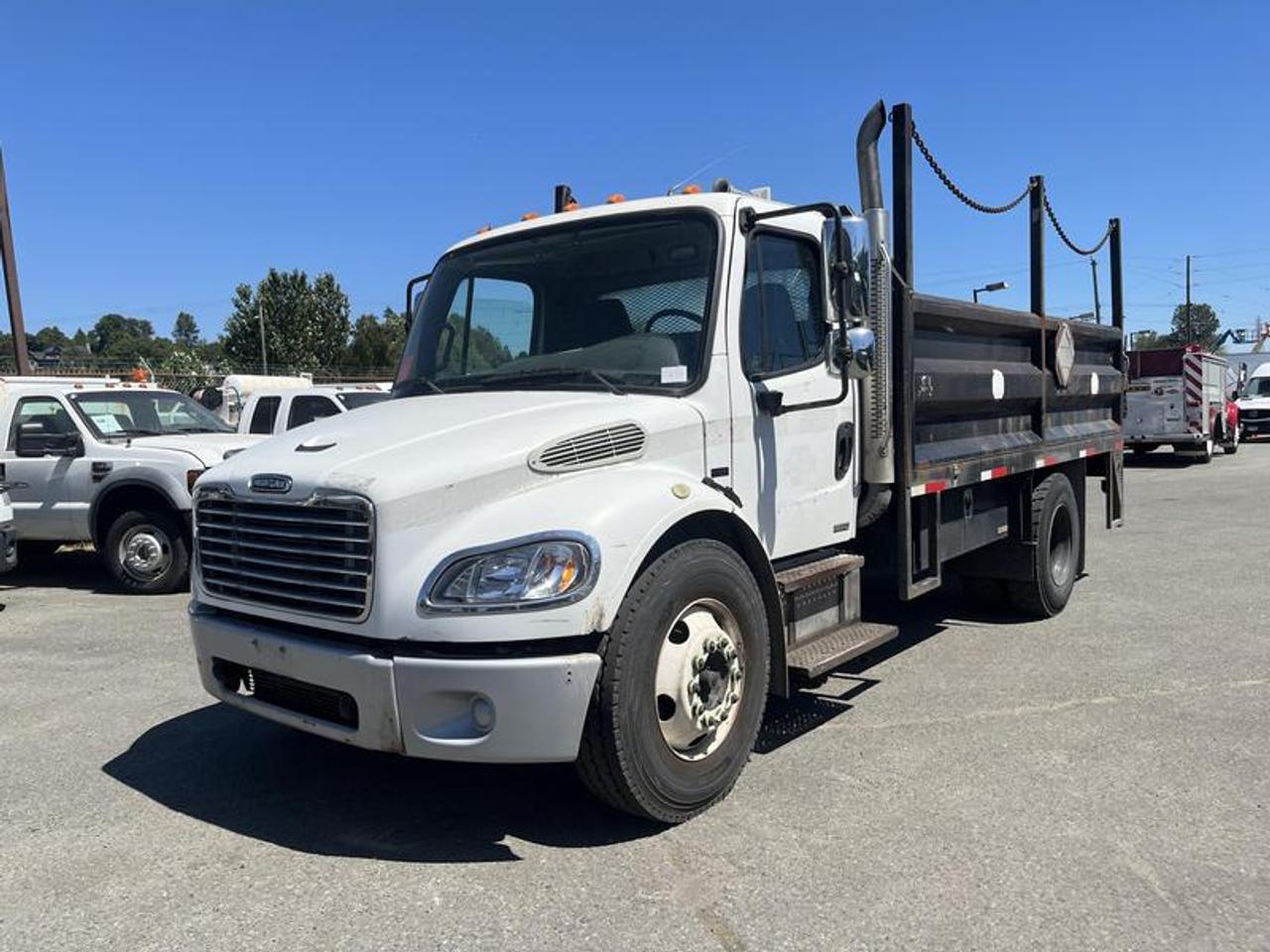 2007 Freightliner M2 106 15 Foot Flat Deck With Power Tail Gate Diesel,  hydraulic brakes 6.4L L6 DIESEL engine, 2 door, automatic, 4X2, AM/FM radio, white exterior, black interior, cloth. Measurements : Length 15 Foot, Width 7 foot 6 inches. (All the measurements are deemed to be true but are not guaranteed.)  $13,840.00 plus $375 processing fee, $14,215.00 total payment obligation before taxes.  Listing report, warranty, contract commitment cancellation fee, financing available on approved credit (some limitations and exceptions may apply). All above specifications and information is considered to be accurate but is not guaranteed and no opinion or advice is given as to whether this item should be purchased. We do not allow test drives due to theft, fraud, acts of vandalism and undetectable impaired driving. Instead we provide the following benefits: Complimentary Warranty (with options to extend), Limited Money Back Satisfaction Guarantee on Fully Completed Contracts, Contract Commitment Cancellation, and an Open-Ended Sell-Back Option. Ask seller for details or call 604-522-REPO(7376) to confirm listing availability.