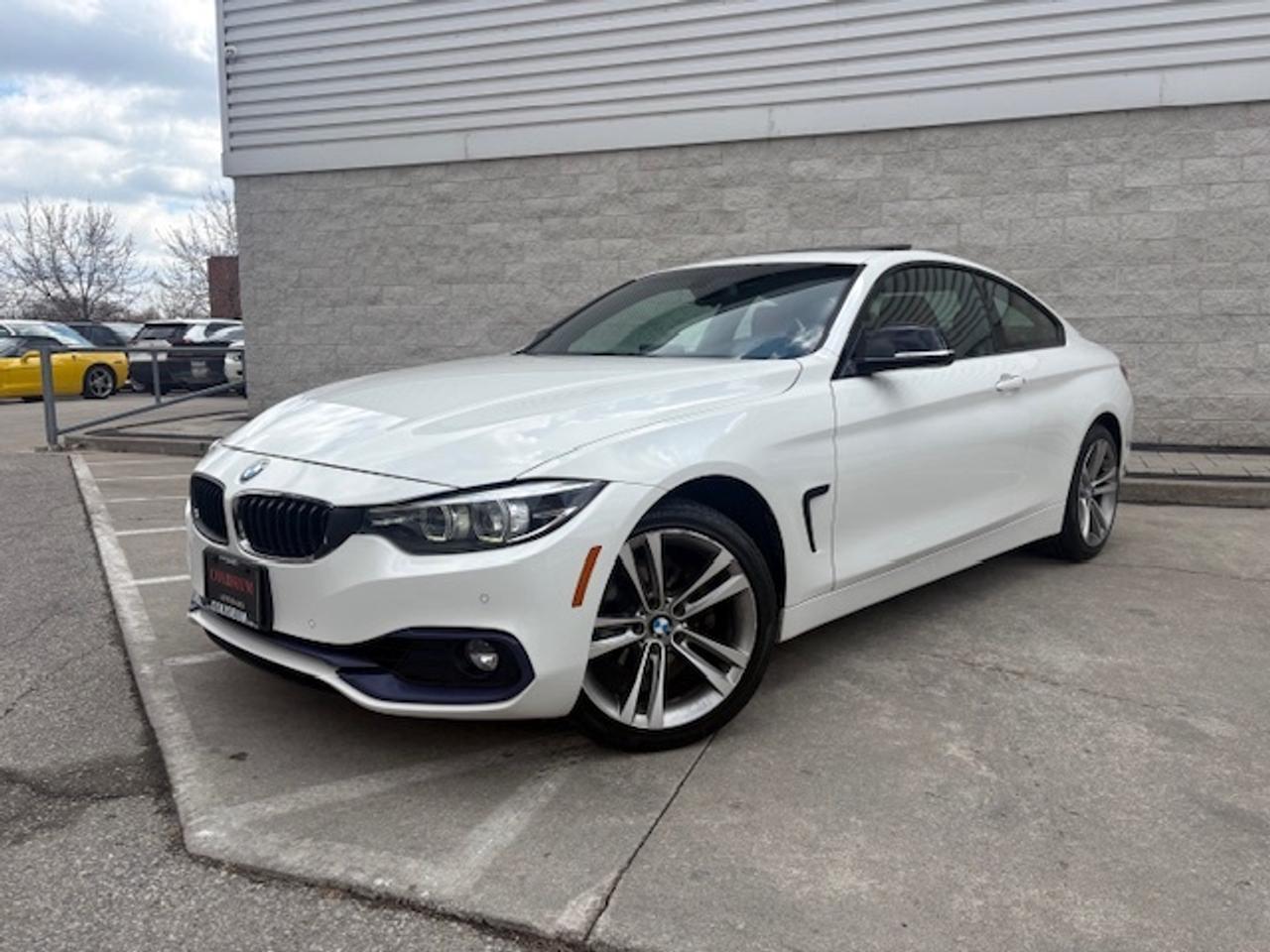 <p>{ CERTIFIED PRE-OWNED }<br><br>**THIS VEHICLE COMES FULLY CERTIFIED WITH A SAFETY CERTIFICATE & SERVICED AT NO EXTRA COST**<br><br>**$0 DOWN...PRIME RATE FINANCING APPROVALS**o.a.c.<br><span id=jodit-selection_marker_1775493217706_33459116902206587 style=line-height: 0; display: none; data-jodit-selection_marker=start></span><br>WE CAN FINANCE INTERNATIONAL STUDENTS, NEW IMMIGRANTS, WORK PERMITS, #9 SIN, AND PR RESIDENTS!<br><br>#BEST DEAL IN TOWN! WHY PAY MORE ANYWHERE ELSE?</p><p><br></p><p>The 2018 BMW 430xi Coupe in Alpine White with striking red leather is where sophistication meets adrenaline. A true drivers machine, this two-door coupe delivers 248 horsepower from its TwinPower Turbo 2.0L engine, with xDrive all-wheel drive ensuring control in every season. Agile, athletic, and beautifully crafted, it embodies the essence of BMW performance and luxury. Experience elegance that commands attention and power that never compromises.</p><p><br></p><p><strong>BMW 430xi Coupe  The Ultimate Expression of Driving Pleasure.</strong></p><p><strong><br></strong></p><p><strong>FINANCING & EXTENDED WARRANTIES AVAILABLE ON ALL VEHICLES! <br><br>COLISEUM AUTO SALES PROUDLY SERVING THE CUSTOMERS FOR OVER 25 YEARS! NOW WITH 2 LOCATIONS TO SERVE YOU BETTER. COME IN FOR A TEST DRIVE TODAY! <br>FOR ALL FAMILY LUXURY VEHICLES..SUVS..AND SEDANS PLEASE VISIT....<br><br>COLISEUM AUTO SALES ON WESTON <br>301 WESTON ROAD <br>TORONTO, ON M6N 3P1 <br>4 1 6 - 7 6 6 - 2 2 7 7</strong></p>