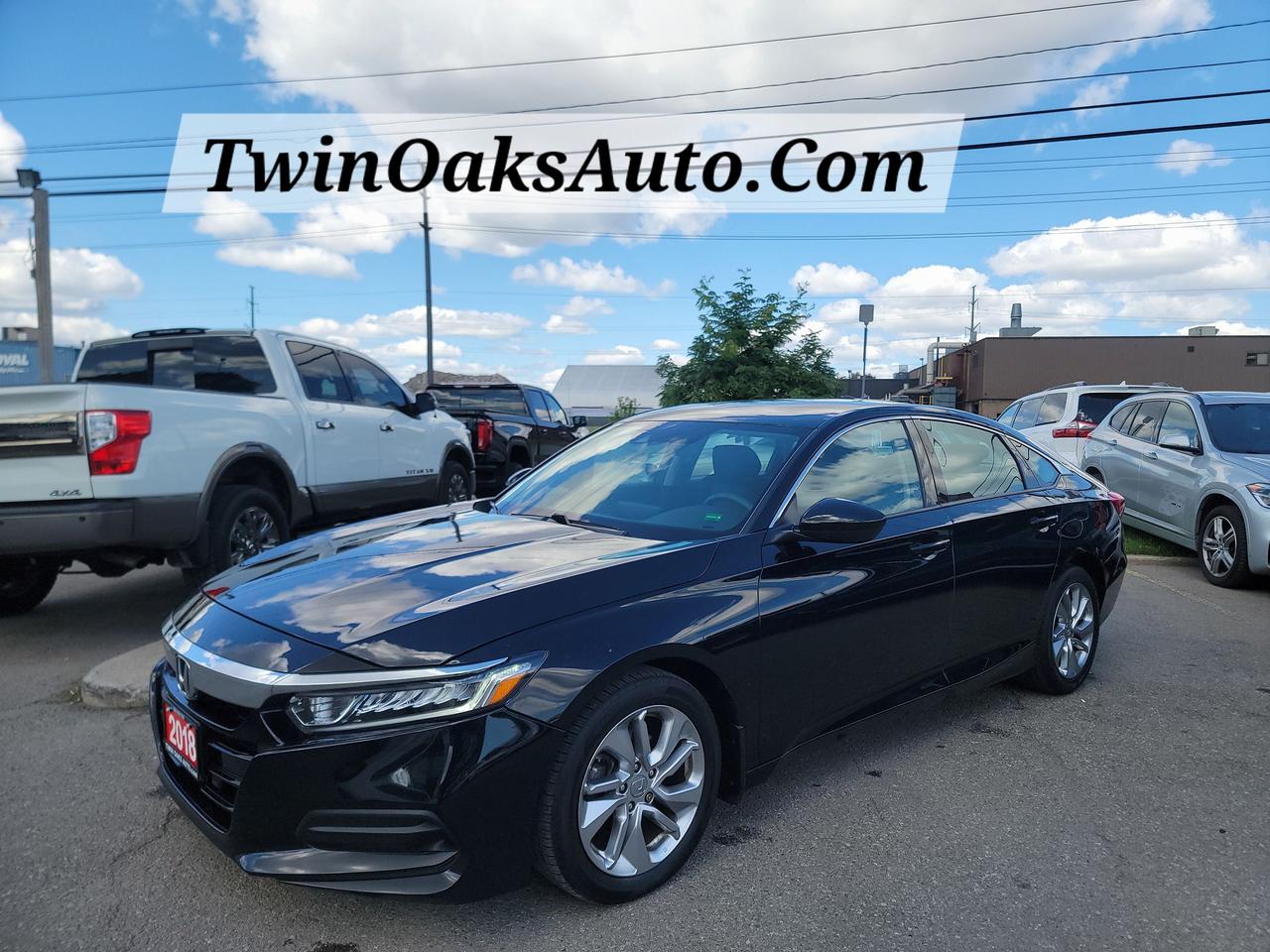 <p data-start=69 data-end=141><strong data-start=69 data-end=139>2018 Honda Accord LX &ndash; Reliable, Fuel Efficient, and Well-Equipped</strong></p><p data-start=143 data-end=371>Up for sale is a <strong data-start=160 data-end=184>2018 Honda Accord LX</strong>, a sedan known for its reliability, comfort, and excellent fuel economy. With its sharp styling and smooth drive, the Accord delivers a perfect balance of performance and practicality.</p><p data-start=373 data-end=388><strong data-start=373 data-end=386>Features:</strong></p><ul data-start=389 data-end=1203><li data-start=389 data-end=428><p data-start=391 data-end=428>1.5L Turbocharged 4-Cylinder Engine</p></li><li data-start=429 data-end=473><p data-start=431 data-end=473>Continuously Variable Transmission (CVT)</p></li><li data-start=474 data-end=495><p data-start=476 data-end=495>Front-Wheel Drive</p></li><li data-start=496 data-end=577><p data-start=498 data-end=577>Excellent fuel efficiency: <strong data-start=525 data-end=575>Approx. 7.9 L/100km city / 6.3 L/100km highway</strong></p></li><li data-start=578 data-end=712><p data-start=580 data-end=712>Honda Sensing Safety Suite (Collision Mitigation Braking, Lane Keeping Assist, Road Departure Mitigation, Adaptive Cruise Control)</p></li><li data-start=713 data-end=744><p data-start=715 data-end=744>Multi-Angle Rearview Camera</p></li><li data-start=745 data-end=769><p data-start=747 data-end=769>17-inch Alloy Wheels</p></li><li data-start=770 data-end=803><p data-start=772 data-end=803>LED Headlights and Taillights</p></li><li data-start=804 data-end=843><p data-start=806 data-end=843>Dual-Zone Automatic Climate Control</p></li><li data-start=844 data-end=865><p data-start=846 data-end=865>Push Button Start</p></li><li data-start=866 data-end=883><p data-start=868 data-end=883>Keyless Entry</p></li><li data-start=884 data-end=951><p data-start=886 data-end=951>7-inch Display with Bluetooth HandsFreeLink and Streaming Audio</p></li><li data-start=952 data-end=1002><p data-start=954 data-end=1002>USB Audio Interface and 4-Speaker Sound System</p></li><li data-start=1003 data-end=1072><p data-start=1005 data-end=1072>Tilt and Telescopic Steering Wheel with Audio and Cruise Controls</p></li><li data-start=1073 data-end=1122><p data-start=1075 data-end=1122>Power Windows, Power Locks, and Power Mirrors</p></li><li data-start=1123 data-end=1181><p data-start=1125 data-end=1181>Comfortable Cloth Interior with Spacious Seating for 5</p></li><li data-start=1182 data-end=1203><p data-start=1184 data-end=1203>Ample Trunk Space</p></li></ul><p data-start=1205 data-end=1367>This Accord is a perfect choice for anyone looking for a stylish sedan with outstanding fuel economy, advanced safety features, and Honda&rsquo;s trusted reliability.</p><p><strong>Additional Certification Cost</strong>: The full certification cost for this vehicle is <strong>$790 + HST</strong>.</p><p><strong>What&rsquo;s Included with Certification</strong>:</p><ul><li>The vehicle will be delivered with a <strong>valid safety certification</strong> and a <strong>36-day safety item warranty</strong> for your peace of mind.</li><li>A <strong>fresh oil change</strong> will be performed, and all fluids will be topped up.</li><li>The vehicle will be <strong>professionally detailed</strong>, ensuring it looks and feels like new when you pick it up.</li></ul><p>At <strong>Twin Oaks Auto</strong>, we are committed to providing a <strong>hassle-free car buying experience</strong>. From your first inquiry to driving off in your new car, our goal is to get you on the road quickly and stress-free!</p><p><strong>Financing Options Available!</strong><br />Flexible financing options are available to suit your needs. Contact us for more details.</p><p><strong>Contact Us Today</strong>:<br />📞 <strong>Call Us</strong>: 905-339-3330<br />📍 <strong>Location</strong>: 2470 Royal Windsor Drive, Oakville, Ontario, L6J 7Y2</p><p><br />(Conveniently located between Ford Drive and Winston Churchill Blvd.)</p><p><strong>More Information</strong>:<br />Visit our website at <strong><a href=http://www.twinoaksauto.com>TwinOaksAuto.com</a></strong> to view additional pictures, explore our inventory, and access CARFAX reports.</p><p>&nbsp;</p>