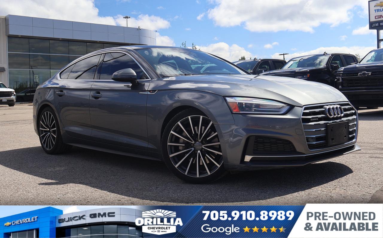 Heated Steering Wheel | Power Adjustable Seat | Driver Memory Seat | Leather-like Interior | All-Wheel Drive

The 2019 Audi A5 Sportback is a sophisticated used luxury compact crossover that blends sleek design with versatile practicality. With four doors and a stylish grey exterior, this model suits drivers who appreciate refined performance and elegant comfort, whether navigating city streets or tackling Canadas diverse road conditions. Its spacious Sportback body style offers the convenience of a hatchback with the sleek profile of a coupe, ideal for those seeking both style and everyday usability.

Under the hood, the A5 Sportback features a 2.0-litre intercooled turbocharged premium unleaded four-cylinder engine paired with an automatic transmission. This combination delivers a smooth and responsive driving experience, while the all-wheel-drive system enhances traction and stability on slippery or uneven Canadian roads. The efficient gas engine balances power and fuel economy, making it well-suited for both urban commuting and longer highway drives through varying climates.

Inside, the cabin is appointed with premium leather seating and a range of comfort and technology features designed to elevate every journey. Power-adjustable seats with memory settings ensure personalized comfort, while the heated steering wheel and rear air and heat controls provide added warmth during cold Canadian winters. The advanced navigation system and satellite radio keep you connected and entertained, complemented by steering wheel audio controls for ease of use. Climate control, power windows, and keyless entry add convenience, while the leather-wrapped steering wheel and auto-dimming mirrors enhance the refined interior ambiance.

Safety and driver assistance features are thoughtfully integrated to support confidence in all conditions. The A5 Sportback includes multiple airbags, traction and stability control, and child-safety locks to protect occupants. Xenon headlights with auto on/off and daytime running lights improve visibility in low-light and adverse weather. Reverse park assist with parking sensors aids in tight spots, while rain sensor wipers and fog lights enhance safety during Canadian rain and fog. The security system and remote trunk release add practical benefits for everyday use.

Overall, this 2019 Audi A5 Sportback offers a compelling blend of luxury, performance, and practicality. Its all-wheel-drive capability, refined interior, and comprehensive safety features make it a versatile choice for Canadian drivers who value style and substance in a premium compact crossover.

Specifications
2.0L Turbocharged Premium Unleaded I-4 Engine
All-Wheel Drive for enhanced traction and control
Leather Interior with heated steering wheel and memory seats
Advanced Navigation System with satellite radio
Reverse Park Assist with parking sensors for easy maneuvering