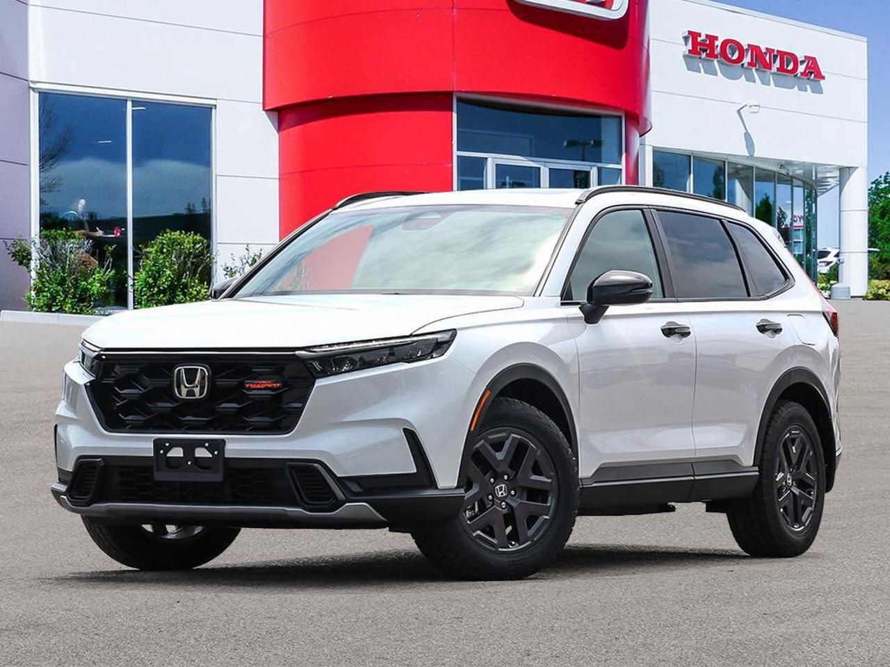 Experience the future of hybrid SUVs with the 2026 Honda CR-V Hybrid TrailSport. This cutting-edge vehicle combines rugged capability with eco-friendly efficiency, perfect for the adventurous and environmentally conscious driver.

- Advanced 2.0L 4-cylinder hybrid powertrain for optimal fuel economy
- Real Time AWD with Intelligent Control System for superior traction
- Spacious interior with heated front bucket seats and 60-40 folding rear seats
- 9-inch touchscreen with wireless Apple CarPlay and Android Auto integration
- Adaptive Cruise Control with Low-Speed Follow for stress-free commuting
- Blind Spot Information System and Rear Cross Traffic Monitor for enhanced safety
- All-terrain tires and 18-inch grey aluminum-alloy wheels for off-road readiness

Dont miss your chance to own this innovative hybrid SUV. Visit Birchwood Honda West today to schedule a test drive and experience the perfect blend of performance and efficiency. Our knowledgeable staff is ready to answer any questions and guide you through the purchase process. Reserve your 2026 Honda CR-V Hybrid TrailSport now and embrace the future of driving.
New Vehicle Disclaimer

Disclaimer: The information provided on this vehicle is for general informational purposes only. While we strive to ensure accuracy, vehicle pricing, specifications, and availability are subject to change without notice. Manufacturers Suggested Retail Price (MSRP) may not reflect actual sales price. Additional fees such as taxes, title, registration, and dealership documentation fees may apply.

All new vehicles come with the manufacturers standard warranty unless otherwise specified. Vehicle images are for illustrative purposes only and may not represent the exact model or trim level. Please contact the dealership directly for the most current information, availability, and details.


We are located in the Birchwood Auto Park, at Portage Ave West and the Perimeter.
Dealer permit #5266