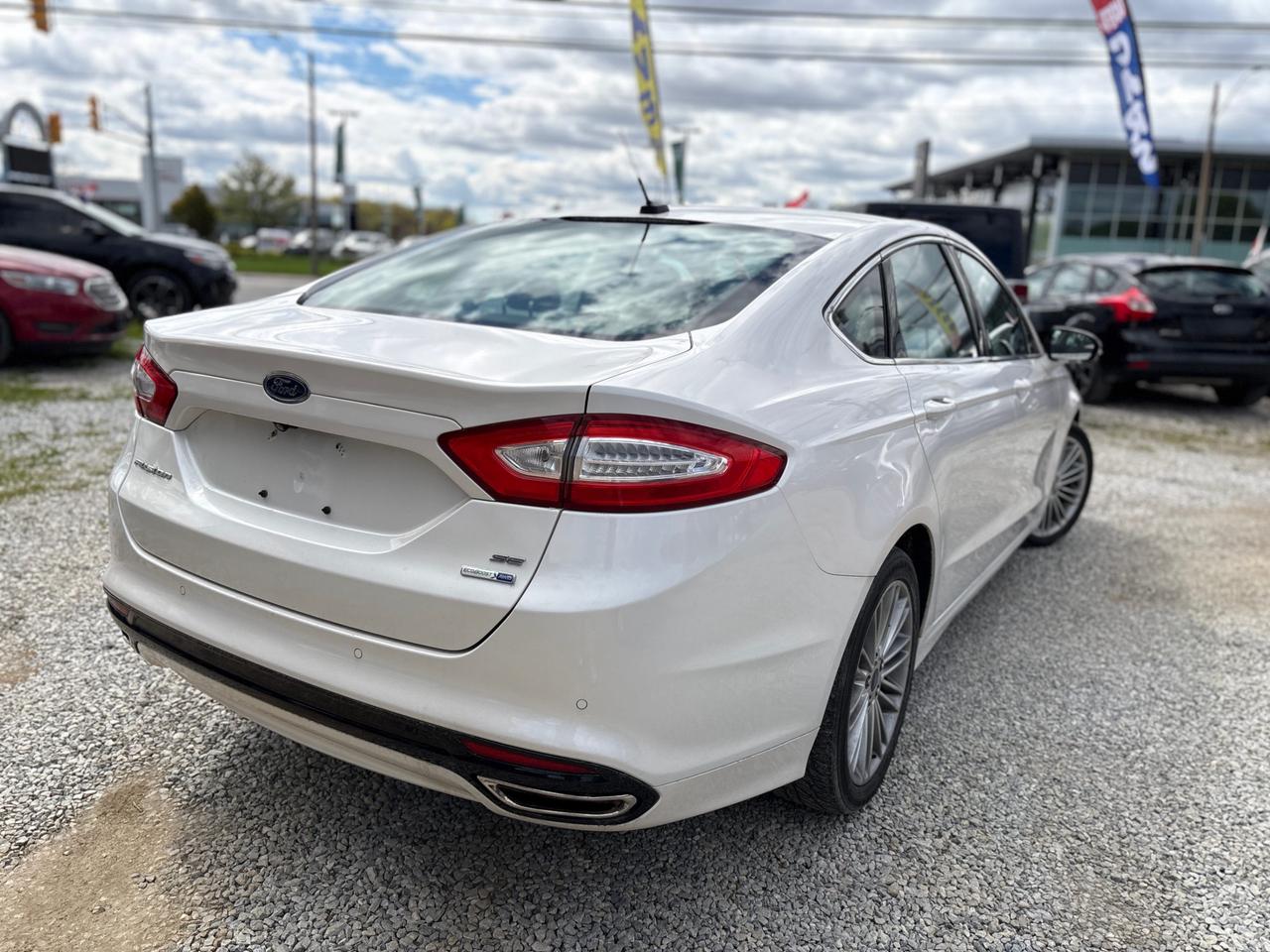 2014 Ford Fusion AWD Executive Package – Clean Carfax | Safety Included | 1-Year Powertrain Photo4