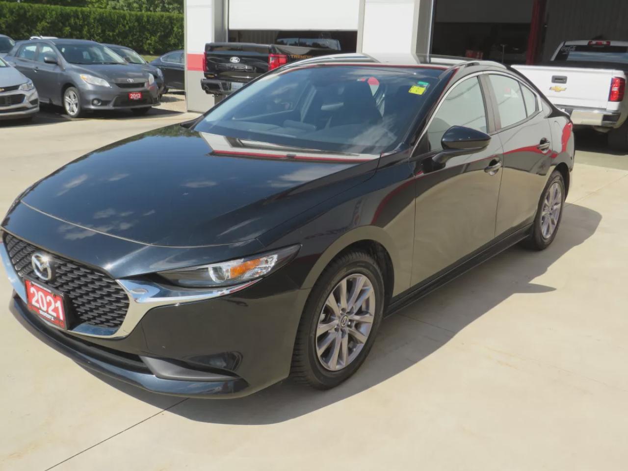 2021 Mazda MAZDA3 GX (**CLEAN TITLE/NO ACCIDENTS!!**SAFETY/CERTIFIED!!**ALLOY RIMS**PUSH BUTTON START**HEATED SEATS**REVERSE CAMERA**SPORT MODE**USB**BLUETOOTH**CRUISE CONTROL**) Photo