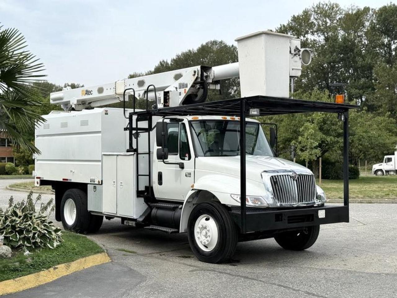 2006 International 4300 Altec Bucket Truck Diesel with 11-Foot Dump, 7.6L, 6 cylinder, 2 door, automatic, 4X2, white exterior, grey interior, vinyl. Altec bucket with platform height of 58 ft and capacity of 350 lbs (158.7 kg), bucket inspection valid until August 19, 2026. Dump box measurements: 11 L x 65 W x 5 H. Overall vehicle dimensions: 308 L x 101 W x 151 H. PTO, outriggers, storage compartments. Certification and decal valid until August 2026. This item is currently OFFSITE. You must register an appointment with our office to schedule an offsite viewing. Appointments must be made a minimum of one business day in advance (and as defined by the days that Repo.com is open for business) before your appointment can be scheduled and confirmed. We may, at our own discretion, instead opt to transport smaller items to Repo.coms main yard for viewing purposes.  $49,830.00 plus $375 processing fee, $50,205.00 total payment obligation before taxes.  Listing report, warranty, contract commitment cancellation fee, financing available on approved credit (some limitations and exceptions may apply). All above specifications and information is considered to be accurate but is not guaranteed and no opinion or advice is given as to whether this item should be purchased. We do not allow test drives due to theft, fraud, acts of vandalism and undetectable impaired driving. Instead we provide the following benefits: Complimentary Warranty (with options to extend), Limited Money Back Satisfaction Guarantee on Fully Completed Contracts, Contract Commitment Cancellation, and an Open-Ended Sell-Back Option. Ask seller for details or call 604-522-REPO(7376) to confirm listing availability.