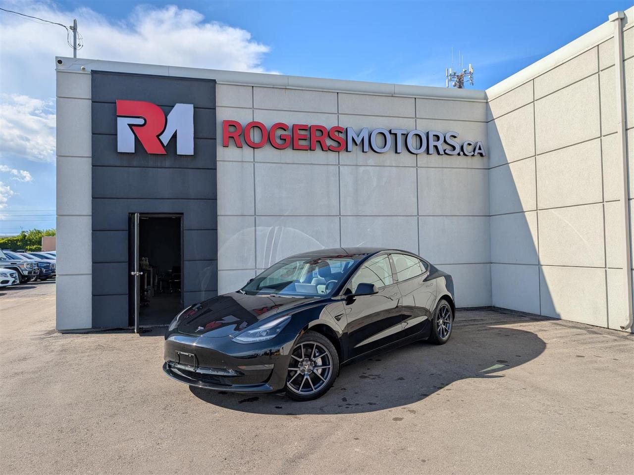 Photo of Black 2021 Tesla Model 3