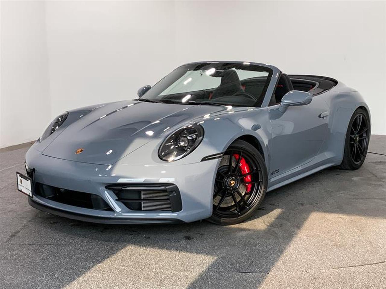 Highly Equipped with Full Body PPF, Porsche Dynamic Chassis Control (PDCC), Rear-Axle Steering, Front Axle Lift System, Premium Package, 18-Way Adaptive Sport Seats Plus w/ Memory Package, LED-Matrix Design Headlights in Black incl. PDLS+, Surround View, BOSE Surround Sound System, Interior Trim in Matte Carbon Fibre, Lane Change Assist (LCA), Heated Multifunction GT Sport Steering Wheel, Ambient Lighting Plus, SportDesign Side Skirts in Exterior Colour, Under Door Puddle Light Projectors, and much more! 2024 Porsche 911 Carrera 4 GTS Cabriolet is finished in Arctic Grey with a Black Leather and Race-Tex Interior featuring Carmine Red Stitching! This Local BC Vehicle has been meticulously kept by One Previous Owner with No Reported Accidents or Claims! This vehicle is a Porsche Approved Certified Pre-Owned Vehicle: 2 extra years of unlimited mileage warranty plus an additional 2 years of Porsche Roadside Assistance. All CPO vehicles have passed our rigorous 111-point check and reconditioned with 100% genuine Porsche parts. We Accept All Trade-Ins and Buy-Ins!! For more details or to schedule a test drive with one of our highly trained sales executives, please send us a website inquiry before it&rsquo;s gone. Porsche Centre Langley has proudly earned the Porsche Premier Dealer Award eight years in a row. Conveniently located just off Highway 1 in Langley, British Columbia, we are committed to helping you find and drive your dream vehicle. Please note: A $599 documentation fee and a $690 dealer preparation fee apply to all pre-owned vehicles. Dealer #40136.