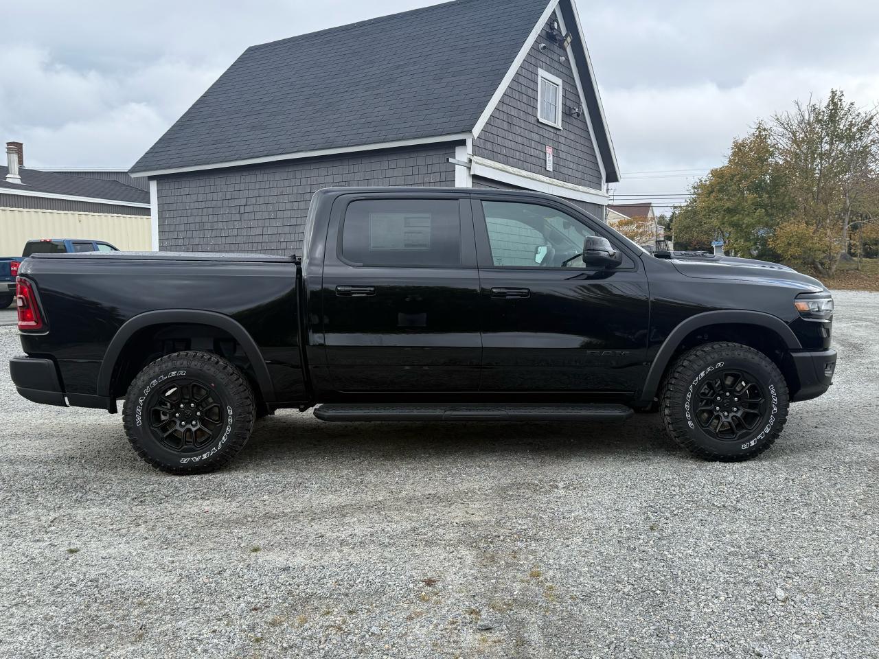 2026 RAM 1500 Rebel 4x4 Crew Cab 5'7" Box Photo4