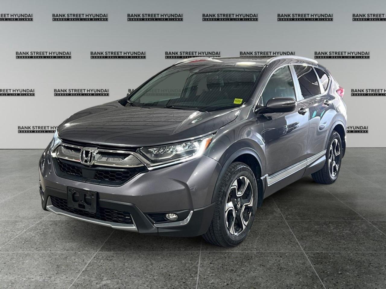Experience the perfect blend of versatility and elegance with the 2017 Honda CR-V Touring in a striking silver finish. This AWD SUV offers exceptional handling and a confident driving experience, thanks to its robust 1.5L 4-cylinder engine paired with an automatic transmission. The 2017 Honda CR-V Touring boasts a beautifully sculpted exterior featuring stylish alloy wheels and a practical sunroof/moonroof. Inside, luxury meets functionality with premium leather seats, a leather steering wheel, and leatherette door trim inserts providing you with the utmost comfort. Expect superior convenience with power seats and windows, while the remote start and keyless entry make every journey hassle-free. Stay connected and safe with the CR-Vs advanced technology suite, featuring a comprehensive navigation system, smart device integration, and satellite radio for endless entertainment. The backup camera and lane assist, complemented by the adaptive cruise control and brake assist, ensure a secure driving experience. Additionally, enjoy the comfort of heated front and rear seats, as well as a heated steering wheel and mirrors for those chilly Canadian winters. Perfectly suited for families or adventure seekers seeking a reliable and stylish vehicle, the 2017 Honda CR-V Touring is designed to elevate your driving experience. Contact the dealership today for more information and to take a closer look at this remarkable SUV. **ADVERTISED PRICE IS FOR FINANCE DEALS ONLY, CASH PRICE MAY BE SUBJECT TO INCREASE. SEE DEALER FOR DETAILS**