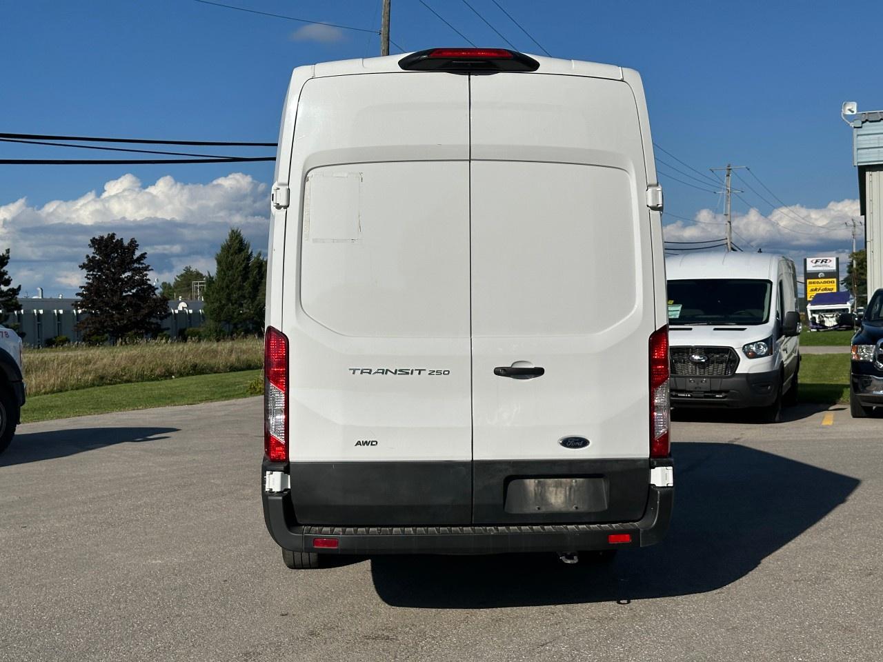2023 Ford Transit Cargo Van T-250 148" EL HI RF 9070 GVWR AWD Photo