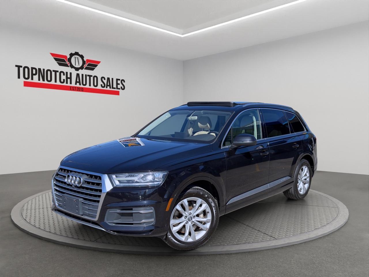 <h2><strong>2017 Audi Q7<span id=jodit-selection_marker_1782241288148_6246488267989351 data-jodit-selection_marker=start style=line-height: 0; display: none;></span></strong></h2><p><strong>Now Available at Topnotch Auto Sales Inc</strong></p><p>Experience luxury, performance, and versatility with the <strong>2017 Audi Q7</strong>, a premium midsize SUV built for comfort and confidence. With its refined interior, advanced technology, and Quattro all-wheel-drive capability, the Q7 offers a dynamic driving experience for families and executives alike.</p><p><br></p><h2><strong>Performance & Capability</strong></h2><p>The 2017 Q7 delivers a smooth yet powerful ride:</p><ul><li>Turbocharged V6 engine with responsive acceleration</li><li>Quattro all-wheel drive for superior traction</li><li>Smooth automatic transmission</li><li>Adaptive air suspension (on select trims) for a comfortable ride</li><li>Excellent handling for both city streets and open highways</li></ul><p>Engineered for luxury performance without compromise.</p><p><br></p><h2><strong>Interior Comfort & Features</strong></h2><p>Step into a sophisticated, spacious cabin:</p><ul><li>Seating for up to seven passengers with flexible configuration</li><li>Premium leather-appointed seats with power adjustments</li><li>Heated front seats for added comfort</li><li>Tri-zone automatic climate control</li><li>Panoramic sunroof (on select trims)</li><li>Large cargo area with fold-flat rear seats</li></ul><p>Designed for comfort, convenience, and style.</p><p><br></p><h2><strong>Technology & Connectivity</strong></h2><p>Stay connected and entertained with advanced features:</p><ul><li>MMI® infotainment system with touchscreen controls</li><li>Apple CarPlay® and Android Auto integration</li><li>Premium Bang & Olufsen® audio system (on select trims)</li><li>Navigation system available</li><li>Bluetooth hands-free calling and audio streaming</li><li>Virtual cockpit digital display (on select trims)</li></ul><p>Technology that keeps you in control and entertained.</p><p><br></p><h2><strong>Safety & Driver Assistance</strong></h2><p>Drive with confidence with Audis suite of safety features:</p><ul><li>Rearview camera and parking sensors</li><li>Blind-spot monitoring and rear cross-traffic alert</li><li>Lane departure warning and lane keeping assist</li><li>Adaptive cruise control (on select trims)</li><li>Electronic stability control and traction control</li><li>Comprehensive airbag system</li></ul><p>Advanced safety designed to protect you and your passengers.</p><p><br></p><h2><strong>Vehicle Condition</strong></h2><p>This <strong>2017 Audi Q7</strong> is in excellent condition, meticulously maintained, and clean inside and outready for its next owner.</p><p><br></p><h2><strong>Why Choose Topnotch Auto Sales?</strong></h2><p>At Topnotch Auto Sales Inc, we provide high-quality vehicles paired with exceptional customer service. Our team ensures a smooth, transparent, and stress-free buying experience.</p><p><br></p><h2><strong>Flexible Financing Solutions</strong></h2><p>We offer financing for all credit types:</p><ul><li>Bad credit / No credit / New credit</li><li>Same-day approvals available</li><li>Low down payment options</li></ul><p>We make it simple to get approved quickly.</p><p><br></p><h2><strong>Certification Option</strong></h2><p>This vehicle can be certified for <strong>$799</strong>, ensuring it meets Ontario safety standards for added peace of mind.</p><p><br></p><h2><strong>OMVIC Compliance</strong></h2><p>Uncertified vehicles are sold asis and must be certified to meet Ontario road safety requirements. Were happy to assist with the certification process.</p><p><br></p><p>With over 14 years of experience, Topnotch Auto Sales Inc is your trusted destination for reliable pre-owned vehicles.</p><p><br></p><p> <strong>Visit Us At:</strong></p><p>5455 Steeles Ave W, North York, ON M9L 1S7</p><p> <strong>Call or Text:</strong></p><p>416-879-7113</p>