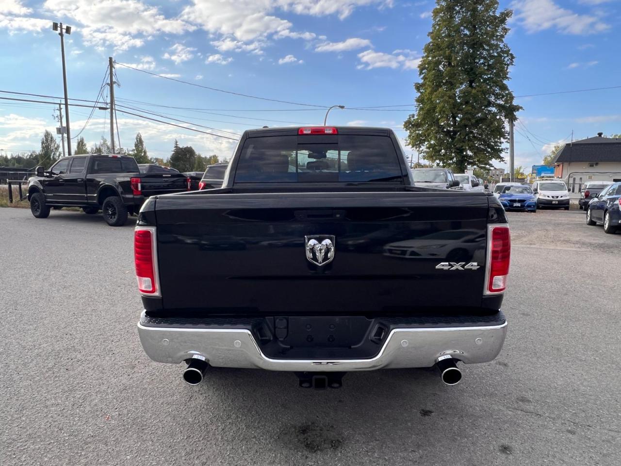 2017 RAM 1500 4WD Crew Cab 140.5" Laramie - Photo #4