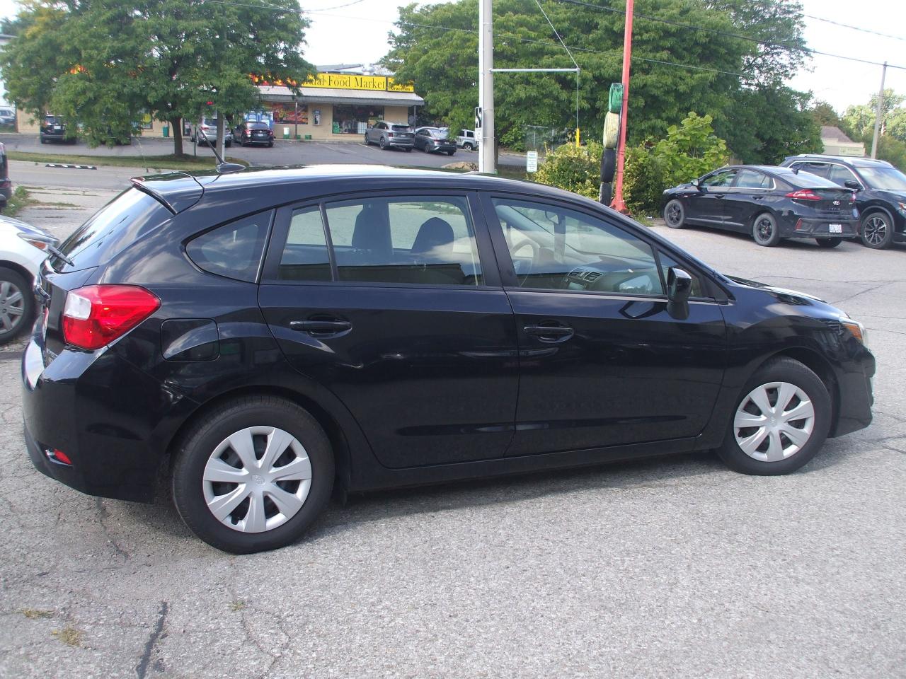 2015 Subaru Impreza 2.0i,AWD,Certified,Winter Tirs on Rims,Backup Cam - Photo #6