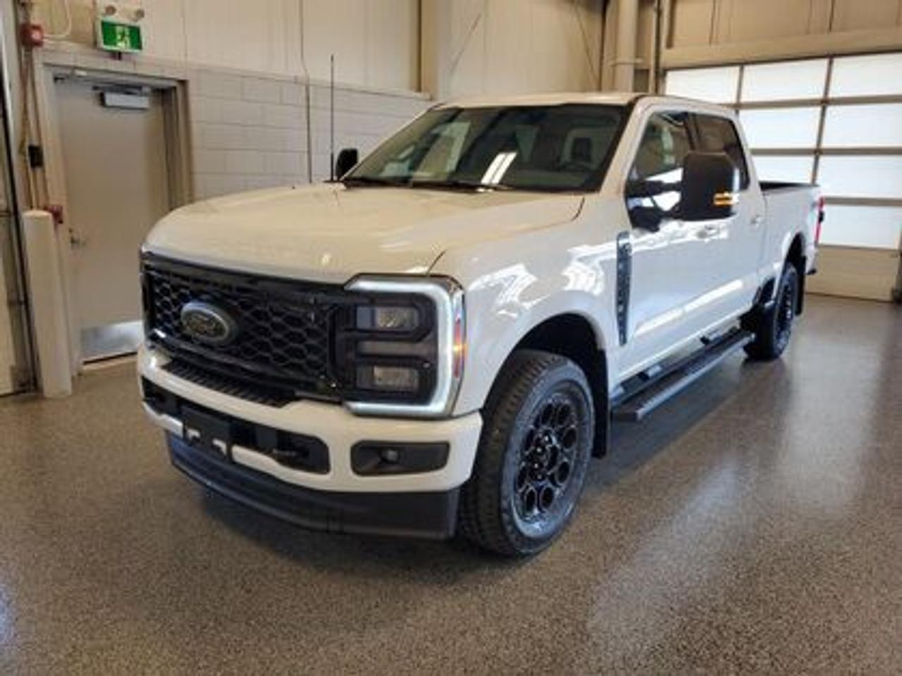 This all new 2026 Ford F-250 XLT Crew Cab 4X4 603A looks absolutely stunning in Oxford White. 

Key Features:
This 2026 F-250 XLT is a built Ford tough truck that leverages physical features and technology that helps you get the job done and enjoy doing it! This specific unit is loaded right up and includes power windows, power locks, air conditioning, power drivers seat, zone lighting, dynamic brake support, outside temperature display, hill start assist, perimeter safety system, four-wheel drive, and so much more. 
Ford Connectivity Package 
8 LCD Touchscreen 
Apple CarPlay & Android Auto Compatibility 
Cruise Control 
Remote Keyless Entry
XLT Premium Package
 -Sirius XM W/360L
 -Powerscope Trailer Tow Mirror
 -B&O Sound System
 -BLIS (Blind Spot Info System)
 -LED Box Lighting
 -Rear Parking Sensors
 -Remote Start
 -360- Degree Camera Package 
 -Heated Front Seats
Black Appearance Package
 -LT275/65R20BSW All Terrain
 -Rear Wheel Well Liners 
 -20 Black Gloss Painted Aluminum Wheels
 -Tough Bed Spray In Bed Liner
FX4 Off Road Package
 -Skid Plates

The 2026 Super Duty is the backbone of Saskatchewan's worksites, built for hauling, towing, and powering through demanding days. The Super Duty makes moving heavy equipment and navigating tight job sites easier and safer. Inside, the cab is designed as a mobile command center with SYNC® 4 technology, large digital displays, and generous storage for tools and gear. Rugged materials, advanced safety systems, keep crews comfortable and productive from the first load to the final shift.

Moose Jaw Ford, conveniently located at 1010 North Service Road in Moose Jaw, is your trusted destination for all your automotive needs. With an impressive 4.8-star Google rating from nearly 1,500 reviews, we are proud to deliver an exceptional vehicle-buying experience tailored just for you. Our Moose Jaw Motives set us apart, offering unbeatable value like half-priced oil changes for life on pre-owned vehicles, one year of key and remote protection, and one year of tire and rim protection. Enjoy peace of mind with every purchase. At Moose Jaw Ford, were committed to driving positive change in our community by combining exceptional service, high-quality vehicles, and a guest-first approach. Visit us today!