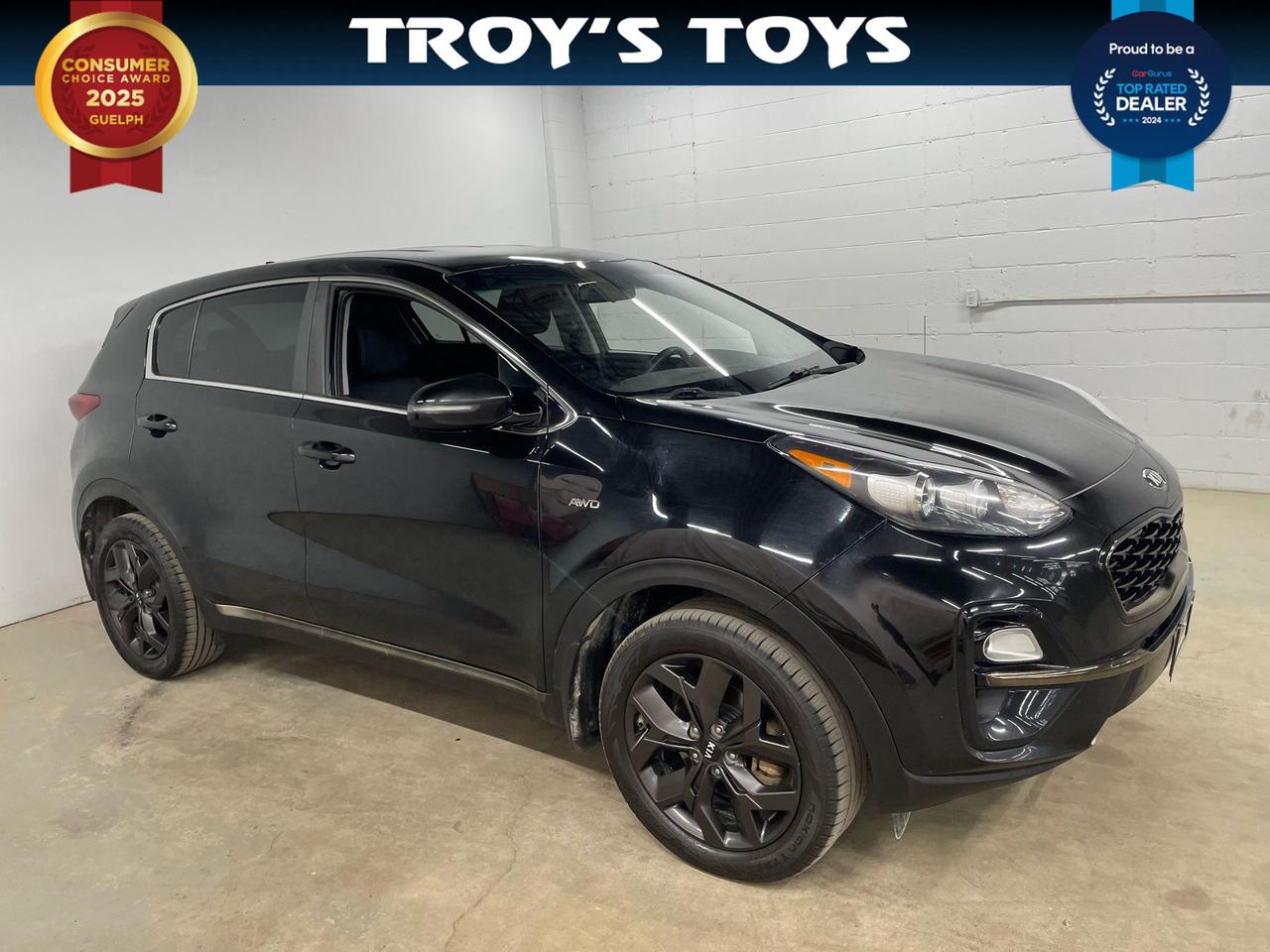 <p>Looking for a reliable and stylish SUV thats ready for any adventure? Check out this sleek, black 2020 Kia Sportage LX at Troys Toys. This versatile crossover is ready to tackle both city streets and weekend getaways. With its comfortable black interior, you and your passengers will enjoy a pleasant ride, no matter the destination. This Sportage has 158,542km on the odometer and is eager to provide many more kilometres of dependable service.</p><p>This Kia Sportage LX is the perfect blend of practicality and performance, offering the capability of All Wheel Drive to confidently handle various road conditions. Its automatic transmission makes for a smooth and effortless driving experience. Whether youre commuting to work, running errands, or heading out for a road trip, the Sportage LX provides a comfortable and connected driving experience. It is a great option for those seeking a reliable and well-equipped SUV.</p><p>Here are some of the standout features that make this 2020 Kia Sportage LX a must-see:</p><ul><li><strong>All-Wheel Drive:</strong> Provides added traction and stability, perfect for tackling unpredictable Canadian weather.</li><li><strong>Sleek Black Exterior:</strong> Turns heads with its modern and sophisticated design.</li><li><strong>Spacious Interior:</strong> Offers ample room for passengers and cargo, making every journey comfortable.</li><li><strong>Automatic Transmission:</strong> Delivers a smooth and effortless driving experience.</li><li><strong>Fuel-Efficient Performance:</strong> Provides impressive gas mileage for both city and highway driving.</li></ul><p><strong><em>Powered by AutoIntelligence&trade;</em></strong> Vehicle information has been generated using artificial intelligence and is provided for informational purposes only. While efforts are made to ensure accuracy, please confirm all details directly with the dealer.</p>