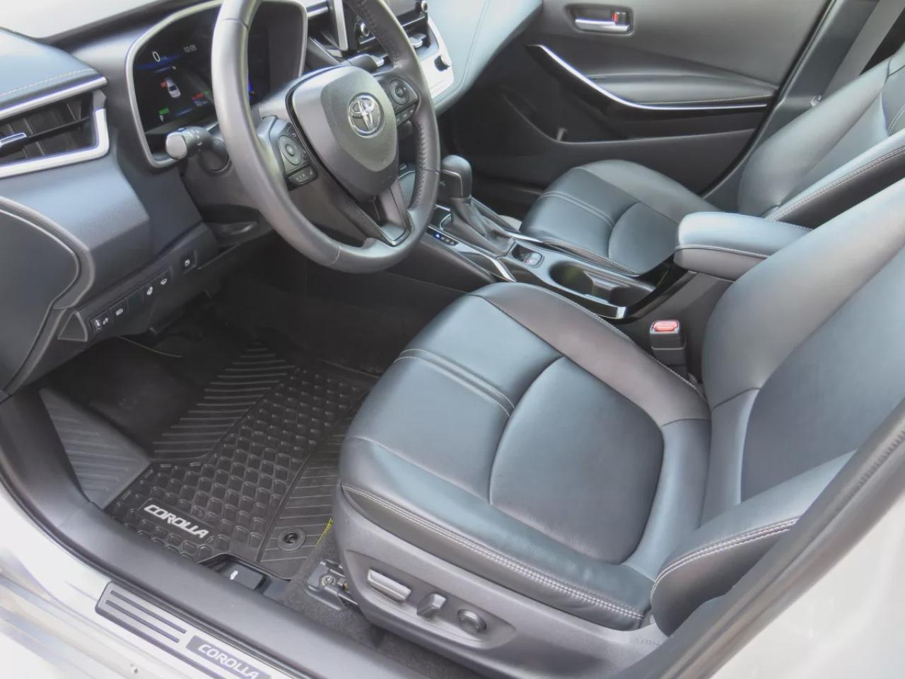 2021 Toyota Corolla Hybrid (**VERY LOW KM!!**CLEAN TITLE/NO ACCIDENTS!!**SAFETY/CERTIFIED!!**HYBRID!!**LEATHER**WIRELESS PHONE CHARGING**PUSH BUTTON START**POWER SEATS**REVERSE CAMERA**DIGITAL TOUCHSCREEN**DRIVE MODES**HEATED SEATS**DIGITAL CLIMATE CONTROL**HEATED STEERING W Photo