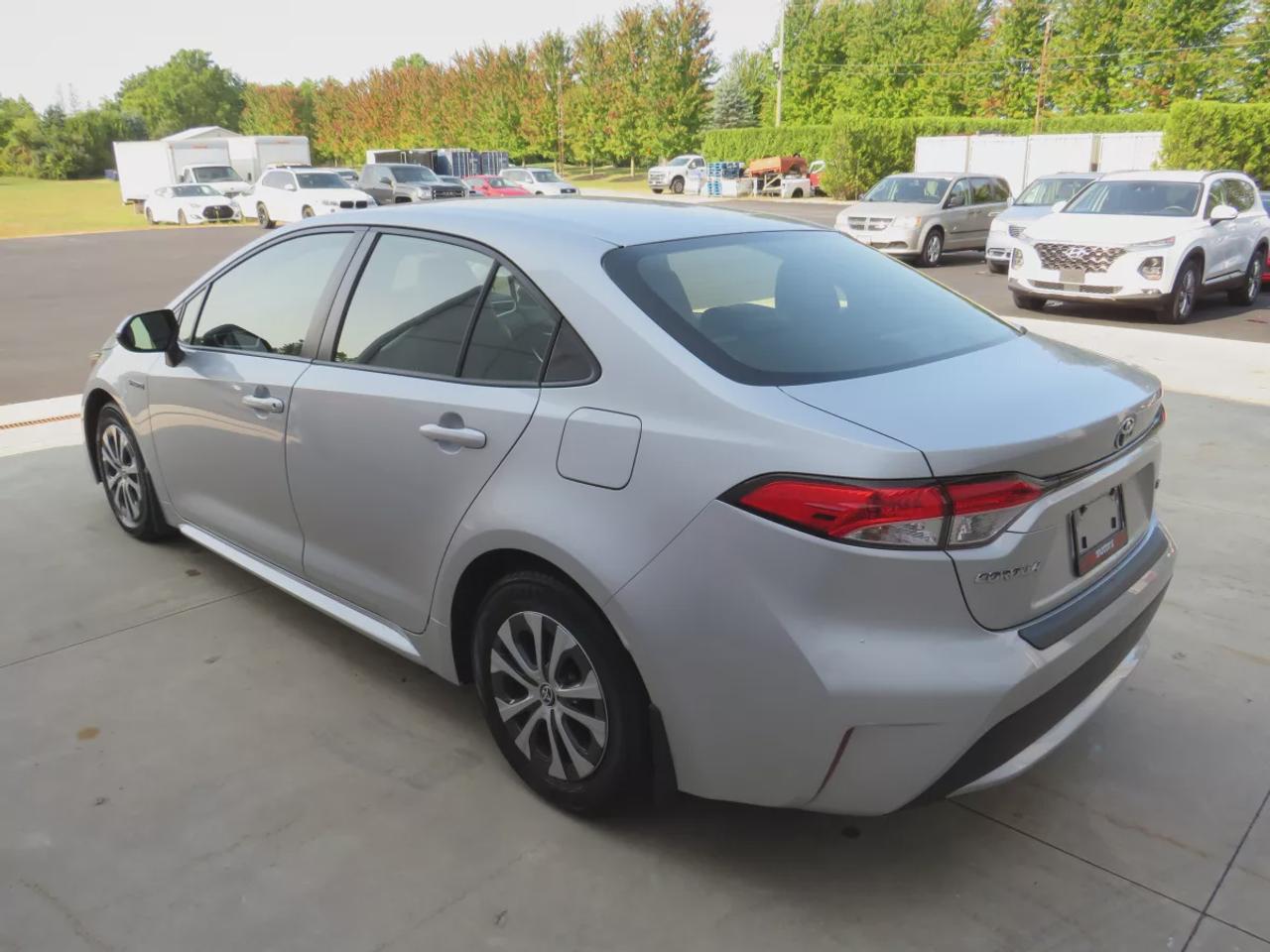 2021 Toyota Corolla Hybrid  | Very Low Km | Clean Title | No Accidents | Safety Certified | Hybrid | Leather | Wireless Phone Charging | Push Button Start | Power Seats | Reverse Camera | Digital Touchscreen | Drive Modes | Heated Seats | Digital Climate Control Photo