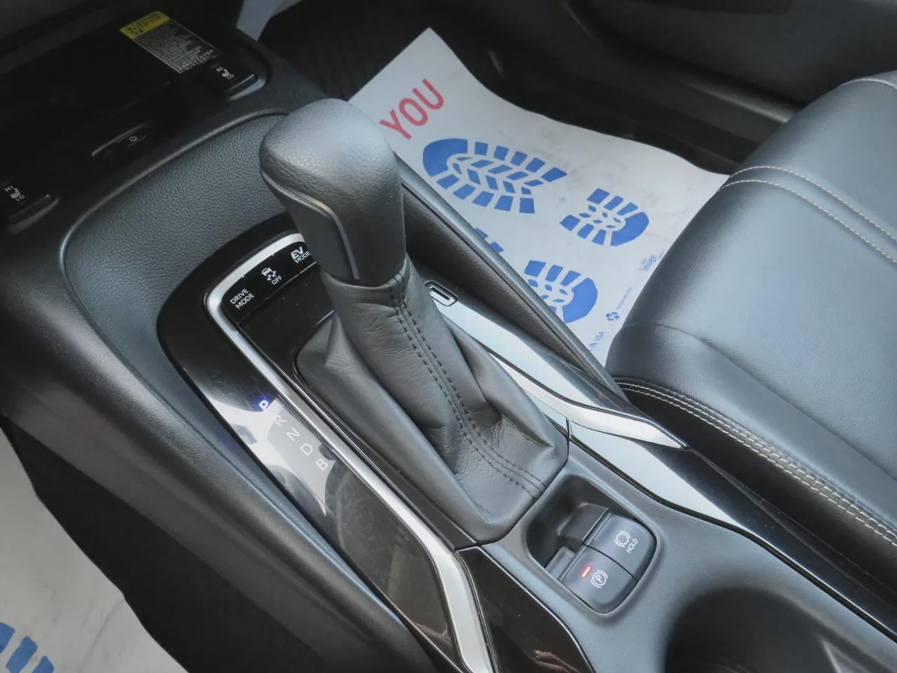 2021 Toyota Corolla Hybrid  | Very Low Km | Clean Title | No Accidents | Safety Certified | Hybrid | Leather | Wireless Phone Charging | Push Button Start | Power Seats | Reverse Camera | Digital Touchscreen | Drive Modes | Heated Seats | Digital Climate Control Photo